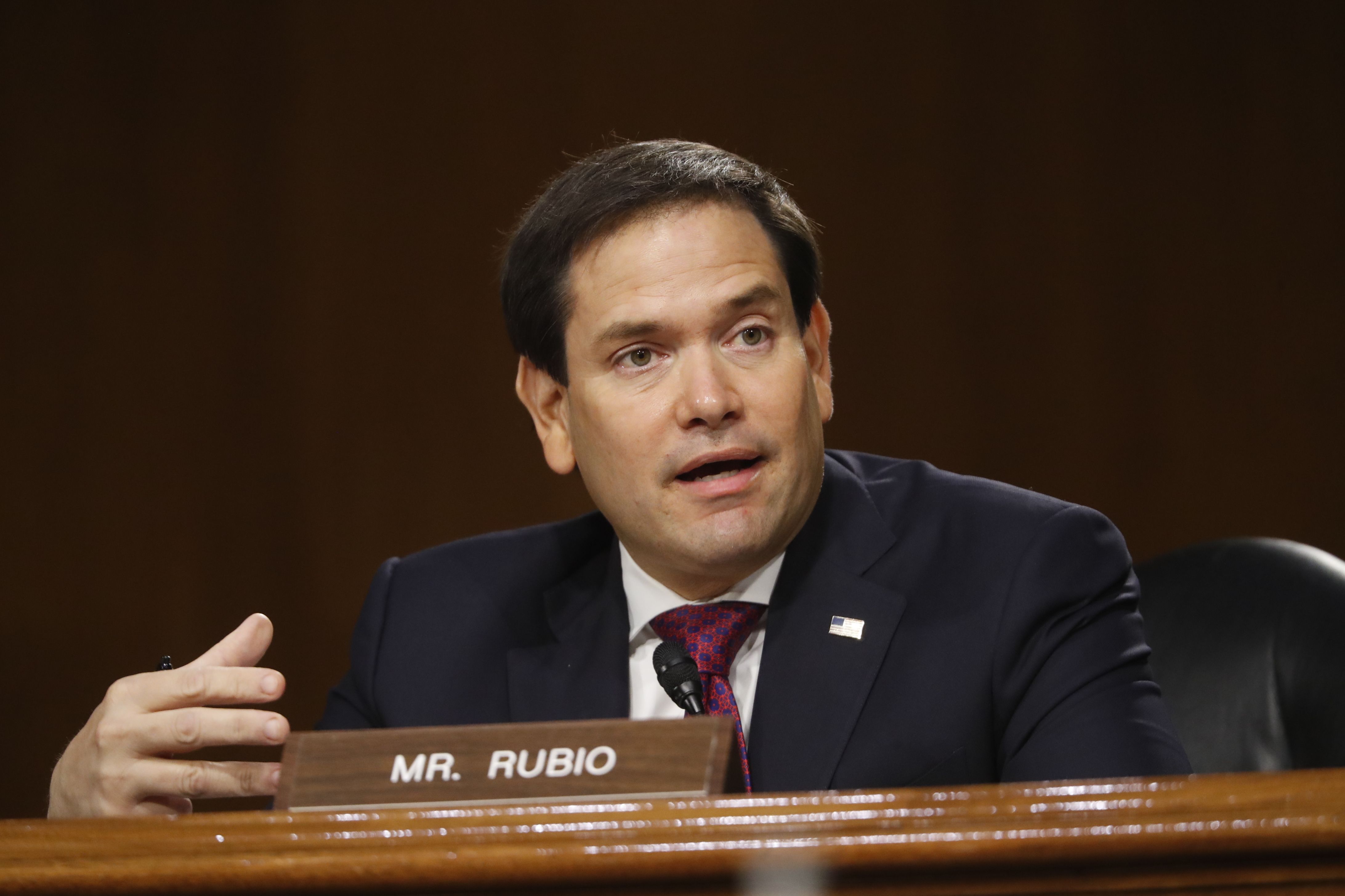 (FILES) In this file photo taken on May 5, 2020 Sen. Marco Rubio, R-FL, speaks during a Senate Intelligence Committee nomination hearing for Rep. John Ratcliffe, R-TX, on Capitol Hill in Washington, DC. - China on August 10, 2020 sanctioned 11 Americans, including senators Marco Rubio and Ted Cruz, in retaliation for similar US moves against Chinese officials over Beijing's crackdown in Hong Kong. "China has decided to impose sanctions on some people that behaved badly on Hong Kong-related issues," foreign ministry spokesman Zhao Lijian said, with Human Rights Watch director Kenneth Roth and National Endowment for Democracy president Carl Gershman also on the list. (Photo by Andrew Harnik / POOL / AFP)