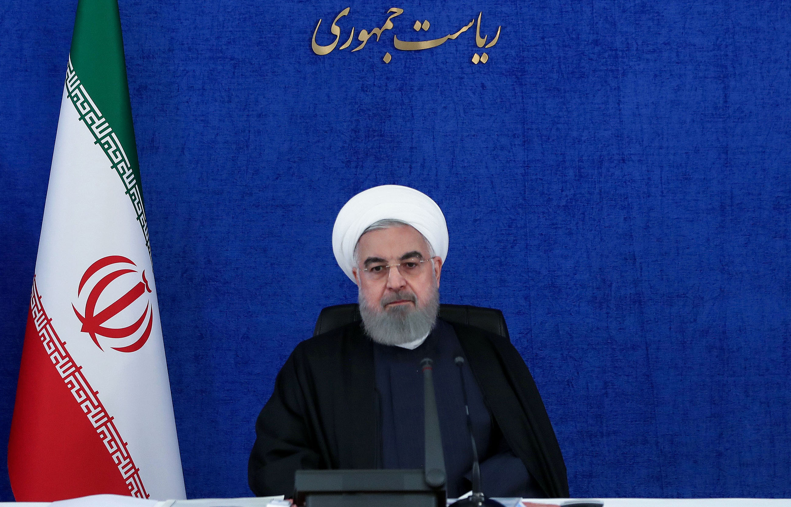 A handout picture provided by the Iranian Presidency on November 28, 2020, shows President Hassan Rouhani chairing a cabinet meeting in the capital Tehran. - Rouhani accused arch-foe Israel of trying to create "chaos" by assassinating one of Tehran's top nuclear scientists, but said his country will not fall into a "trap". (Photo by - / Iranian Presidency / AFP) / === RESTRICTED TO EDITORIAL USE - MANDATORY CREDIT "AFP PHOTO / HO / IRANIAN PRESIDENCY" - NO MARKETING NO ADVERTISING CAMPAIGNS - DISTRIBUTED AS A SERVICE TO CLIENTS ===