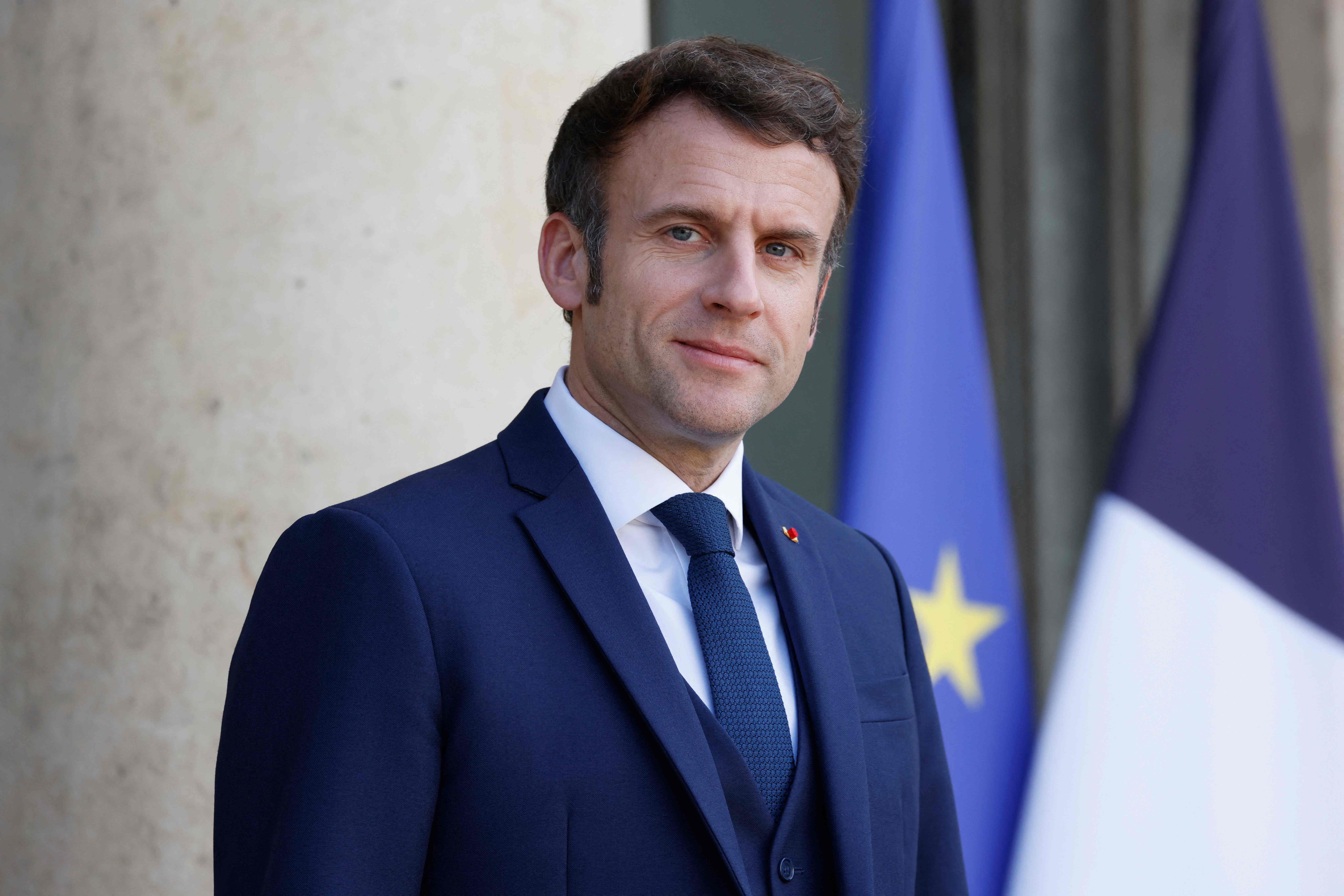 French President Emmanuel Macron looks on prior to greet Georgia's President at the Elysee Palace in Paris on February 28, 2022. (Photo by Ludovic MARIN / AFP)