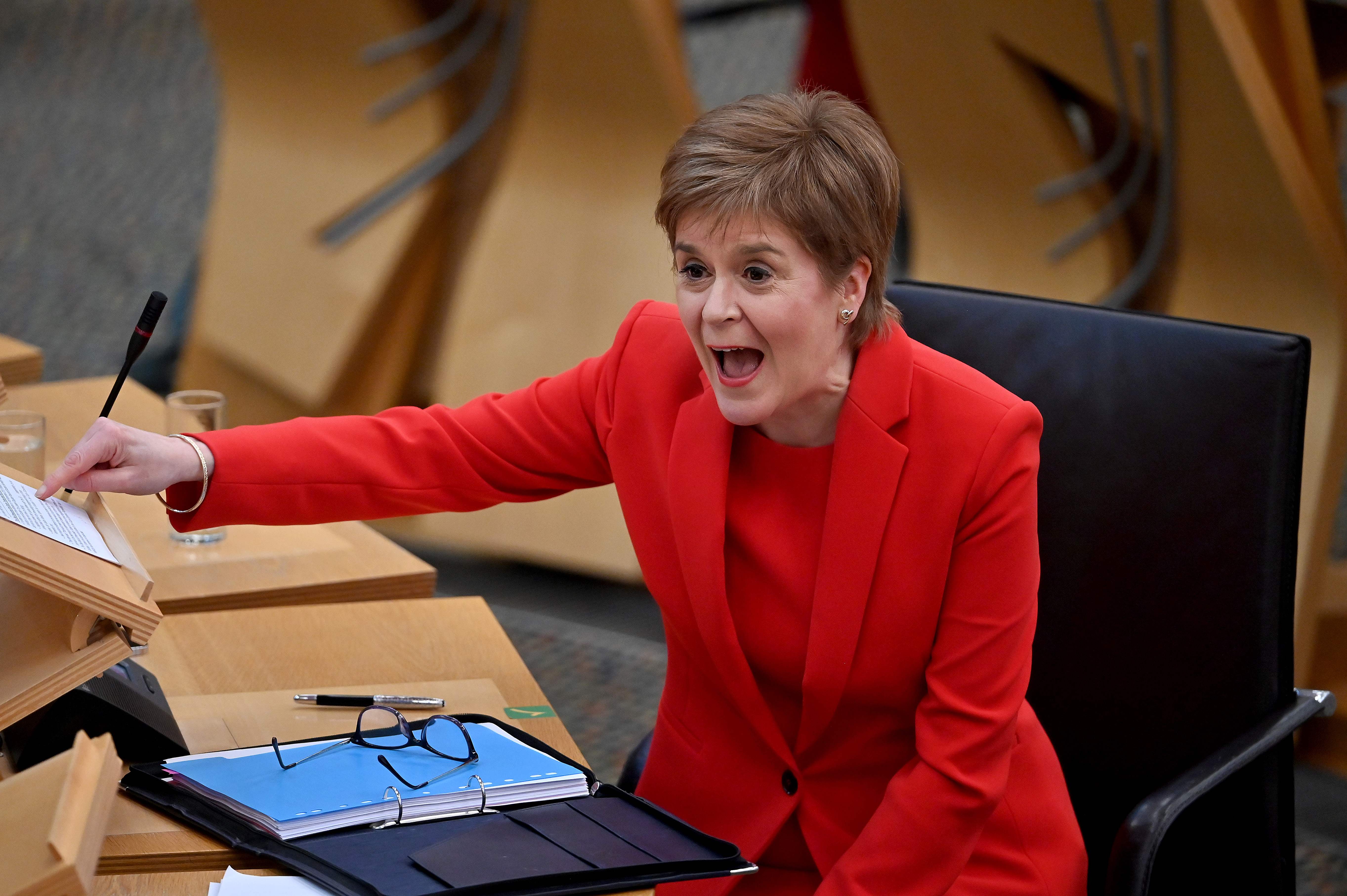 Scotland's First Minister Nicola Sturgeon speaks during the debate at the Scottish Parliament on the trade and co-operation agreement between the UK and the EU (European Union) on December 30, 2020 in Edinburgh, Scotland. (Photo by Jeff J Mitchell / POOL / AFP)