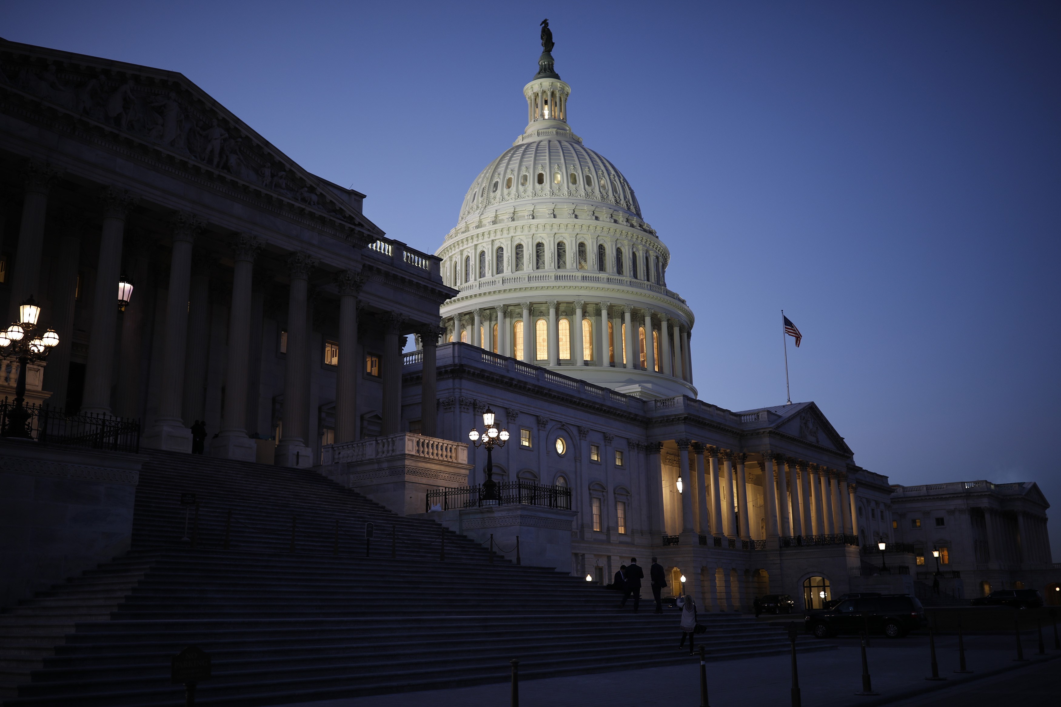 WASHINGTON, DC - JANUARY 19: The U.S. Capitol is seen as lawmakers work to avert a government shutdown January 19, 2018 in Washington, DC. A continuing resolution to fund the government has passed the House of Representatives but faces a stiff challenge in the Senate. Aaron P. Bernstein/Getty Images/AFP
== FOR NEWSPAPERS, INTERNET, TELCOS & TELEVISION USE ONLY ==