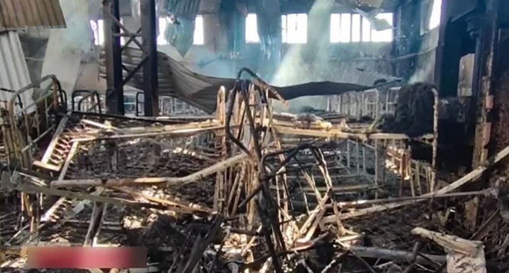 This handout picture released by the Russian Investigative Committee on July 29, 2022 shows what is said is the destroyed detention centre in the settlement of Olenivka in the separatist-held region of Donetsk. - Russia and Moscow-backed separatists on July 29, 2022 accused Kyiv's forces of striking a jail holding Ukrainian prisoners of war in eastern Ukraine, saying dozens of people died and scores were wounded. Kyiv denied its forces had struck a prison holding Ukrainian prisoners of war. (Photo by Handout / Investigative Committee of Russia / AFP) / RESTRICTED TO EDITORIAL USE - MANDATORY CREDIT "AFP PHOTO / Russian Investigative Committee / handout" - NO MARKETING NO ADVERTISING CAMPAIGNS - DISTRIBUTED AS A SERVICE TO CLIENTS