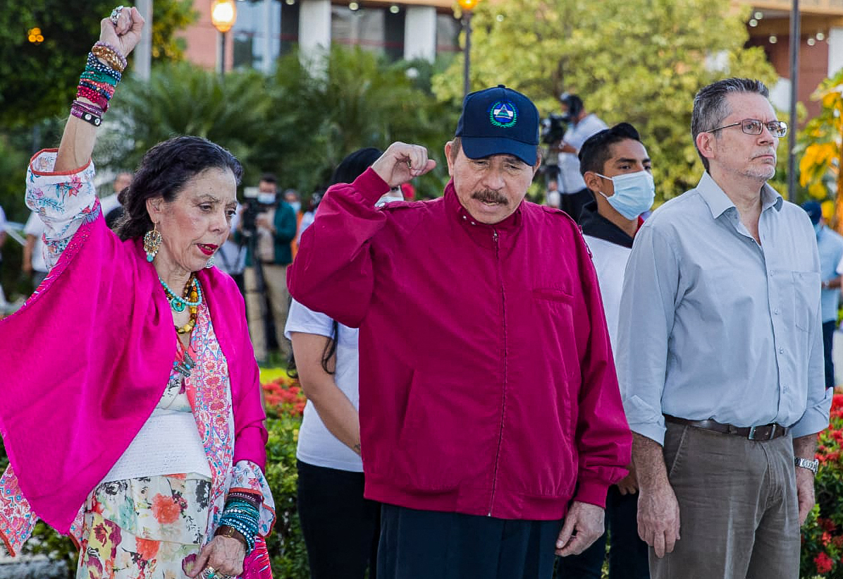 Handout picture released by Nicaraguan Presidency shows Nicaraguan President Daniel Ortega (C), Vice-President Rosario Murillo (L) and Carlos Fonseca Teran (R) attending to the anniversary ceremony of Sandinista leader Carlos Fonseca Amador birth at the Plaza de la Revoluci�n in Managua on June 23, 2021. (Photo by Handout / Nicaraguan Presidency / AFP) / RESTRICTED TO EDITORIAL USE - MANDATORY CREDIT "AFP PHOTO / NICARAGUAN PRESIDENCY / CESAR PEREZ " - NO MARKETING - NO ADVERTISING CAMPAIGNS - DISTRIBUTED AS A SERVICE TO CLIENTS