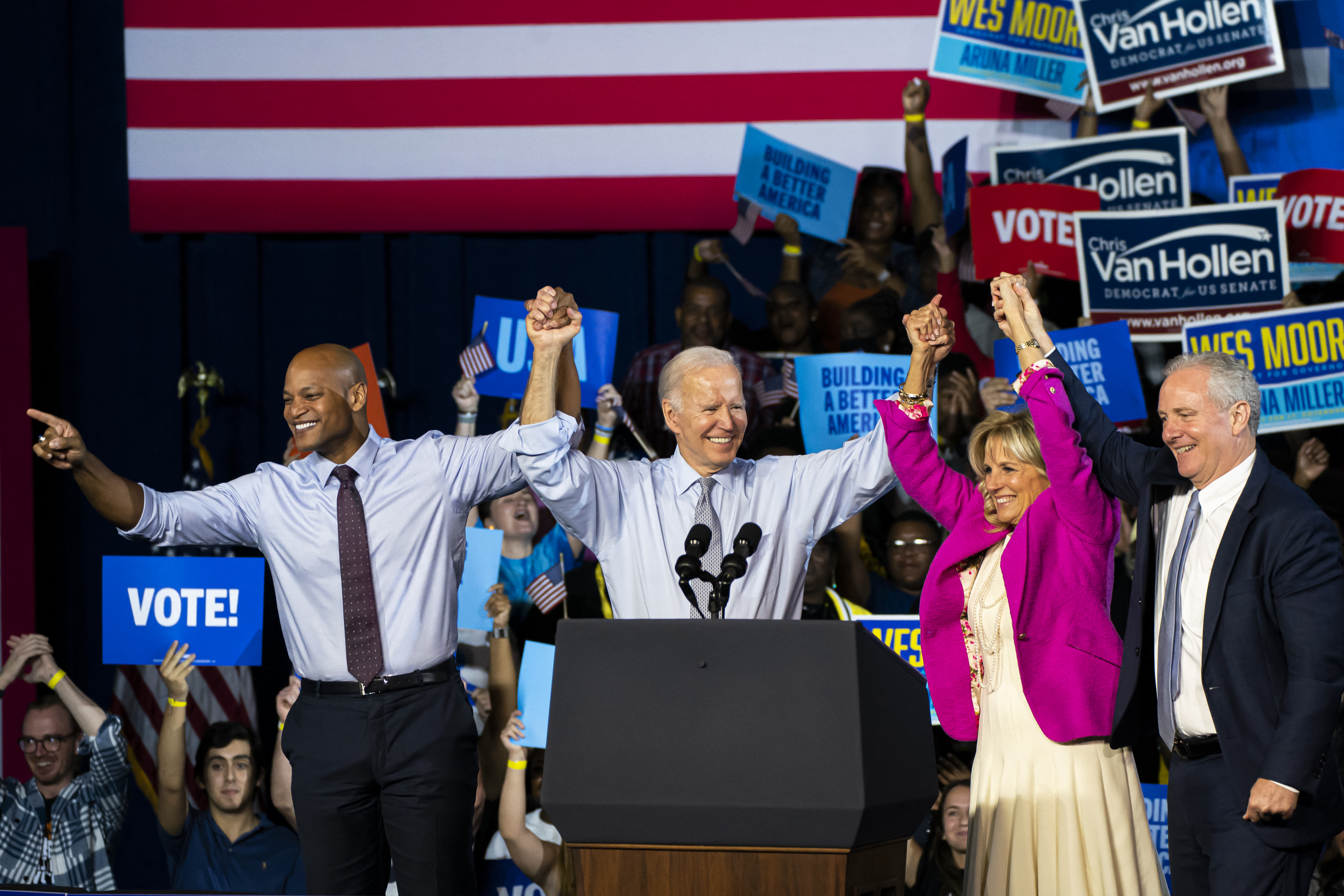 BOWIE, MD - NOVEMBER 07: Democratic gubernatorial candidate Wes Moore (L) raises arms with President Joe Biden, first lady Jill Biden and U.S. Sen. Chris Van Hollen (D-MD) during a campaign rally at Bowie State University on November 7, 2022 in Bowie, Maryland. Moore faces Republican state Rep. Dan Cox in tomorrow's general election. Nathan Howard/Getty Images/AFP (Photo by Nathan Howard / GETTY IMAGES NORTH AMERICA / Getty Images via AFP)