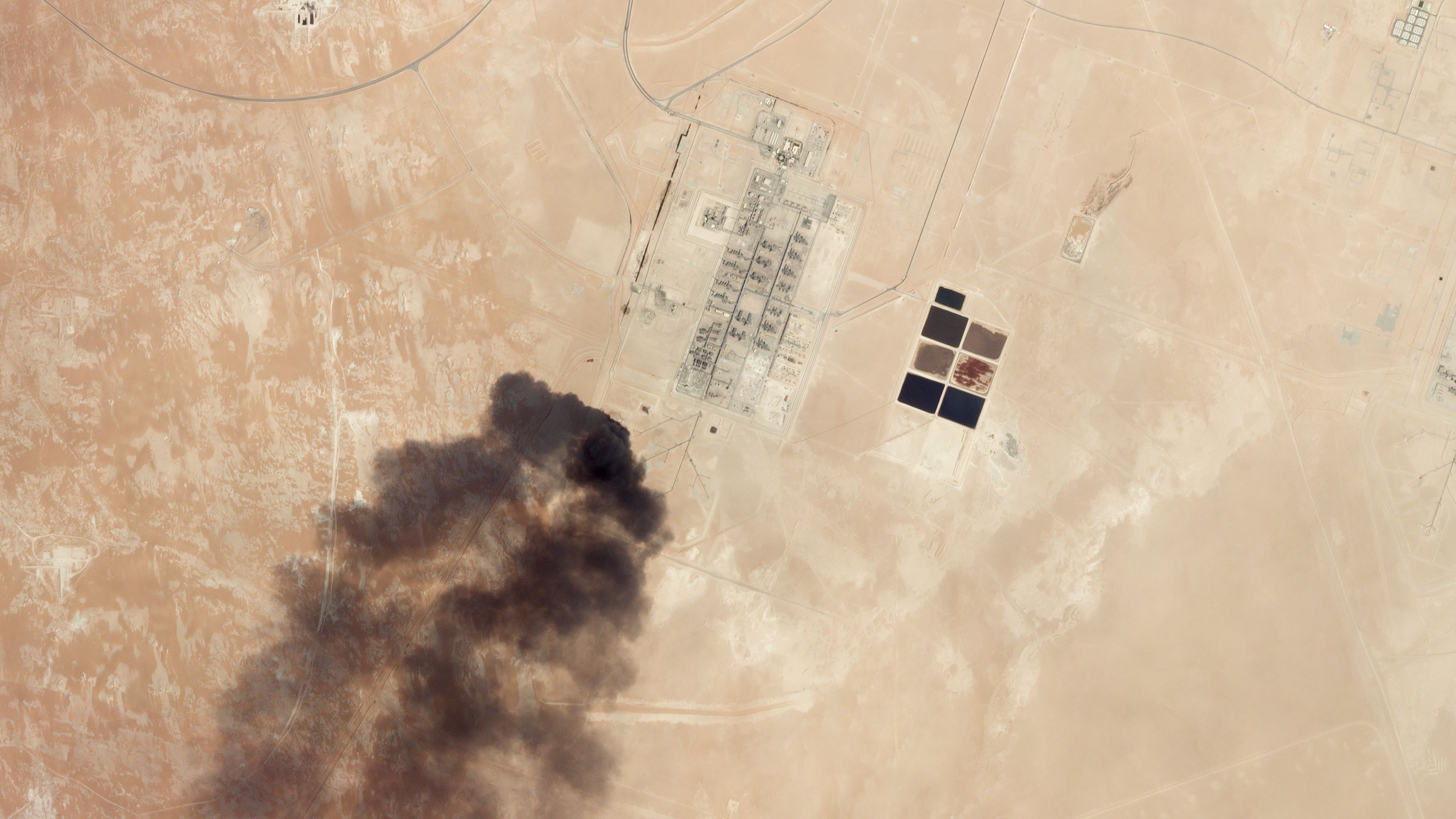 This satellite overview handout image obtained September 16, 2019 courtesy of Planet Labs Inc. shows damage to oil/gas infrastructure from weekend drone attacks at Haradh Gas Plant on September 14, 2019 in Saudi Arabia. - Drone attacks on key Saudi oil facilities have halved crude output from OPEC's biggest exporter, catapulting oil prices by the largest amount since the first Gulf War. The crisis has focused minds on unrest in the crude-rich Middle East, with Tehran denying Washington's charge that it was responsible.Brent oil prices leapt 20 percent on Monday to chalk up the biggest intra-day daily gain since 1991. (Photo by HO / PLANET LABS INC. / AFP) / RESTRICTED TO EDITORIAL USE - MANDATORY CREDIT "AFP PHOTO / Planet Labs Inc. / HO" - NO MARKETING NO ADVERTISING CAMPAIGNS - DISTRIBUTED AS A SERVICE TO CLIENTS == NO ARCHIVE