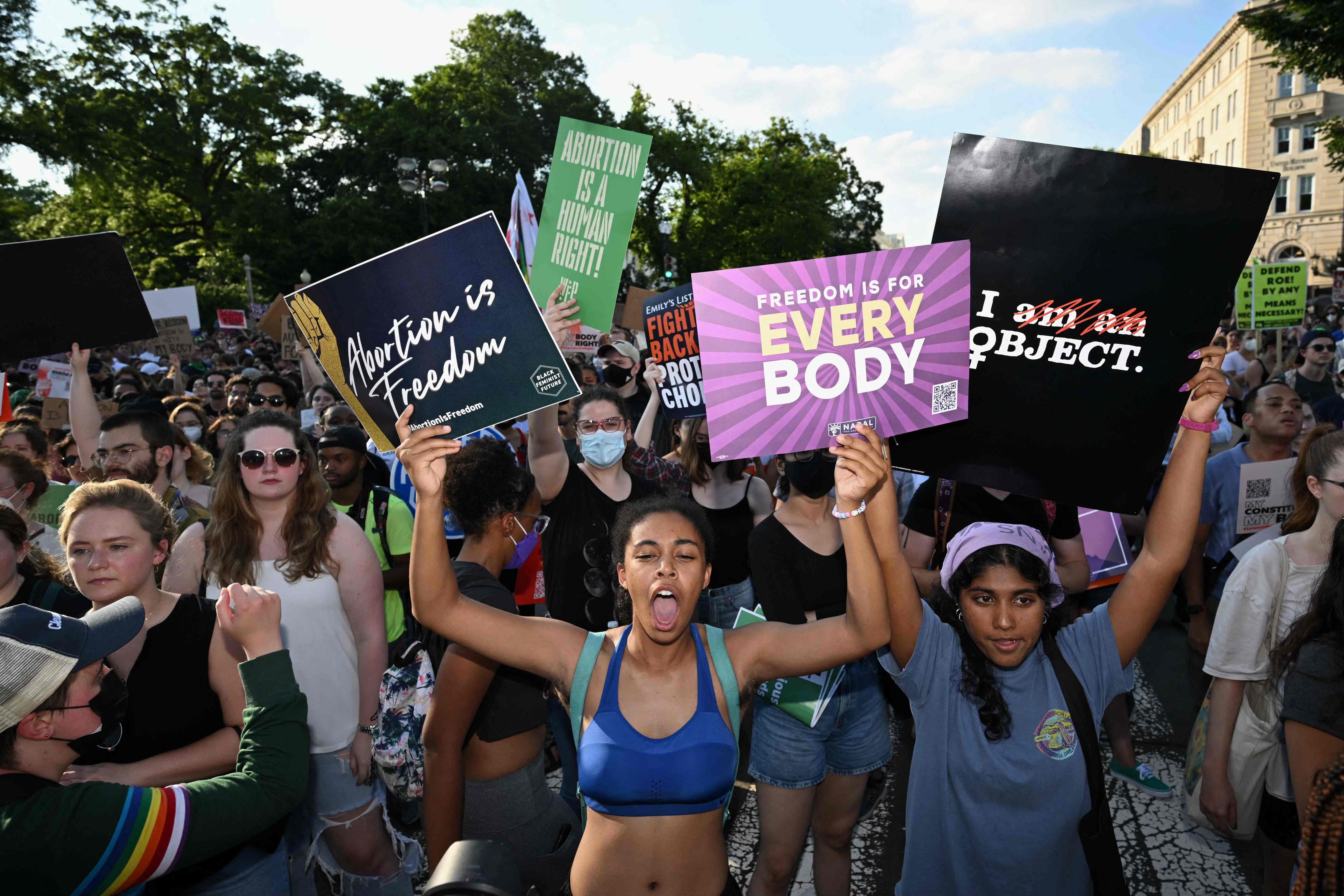 Abortion rights activists rally outside of the US Supreme Court after the overturning of Roe Vs. Wade, in Washington, DC, on June 24, 2022. (Photo by Mandel NGAN / AFP)