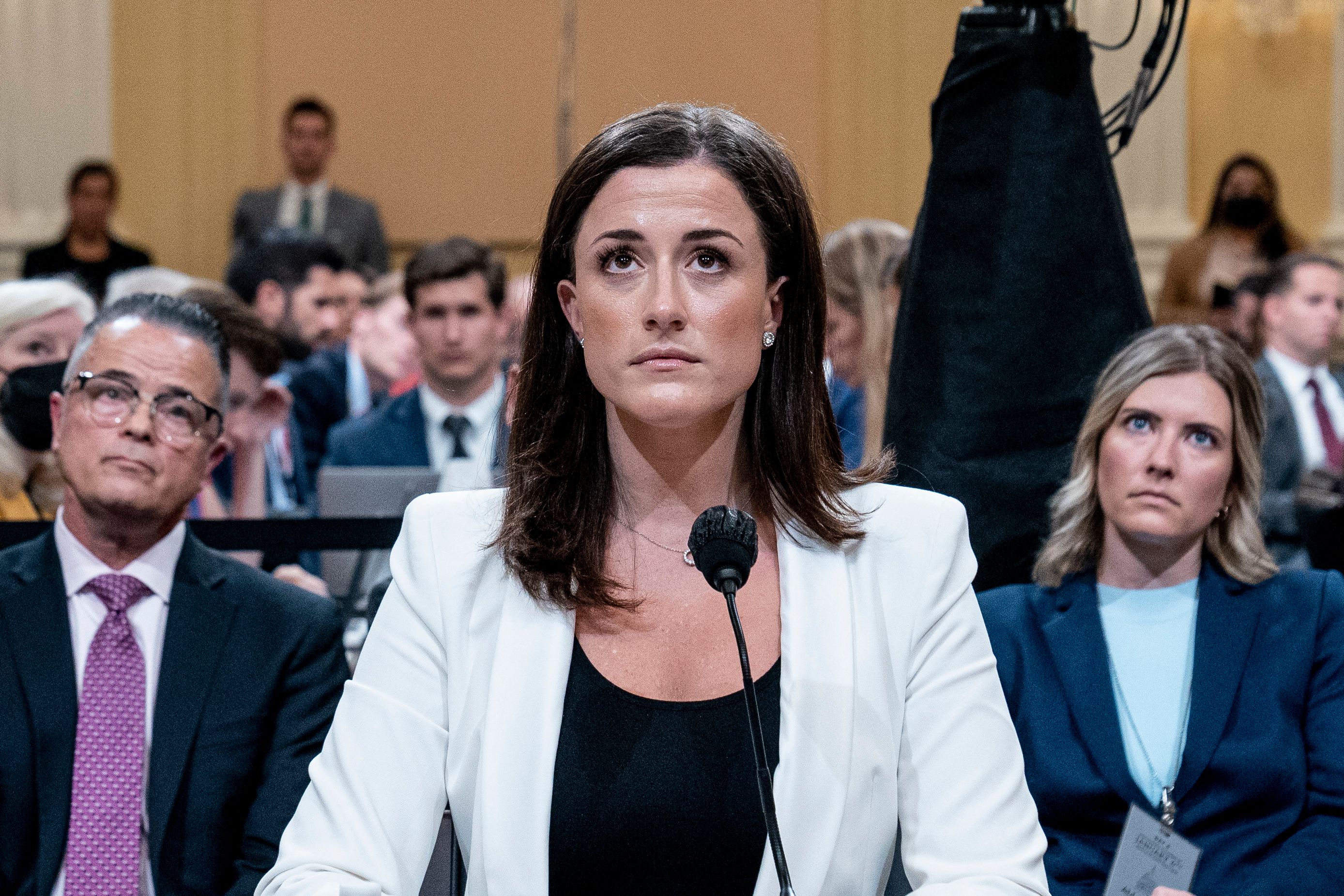 Cassidy Hutchinson, former aide to Trump White House chief of staff Mark Meadows, watches a video play during a House Select Committee hearing to Investigate the January 6th Attack on the US Capitol, in the Cannon House Office Building on Capitol Hill in Washington, DC on June 28, 2022. (Photo by Andrew Harnik / POOL / AFP)