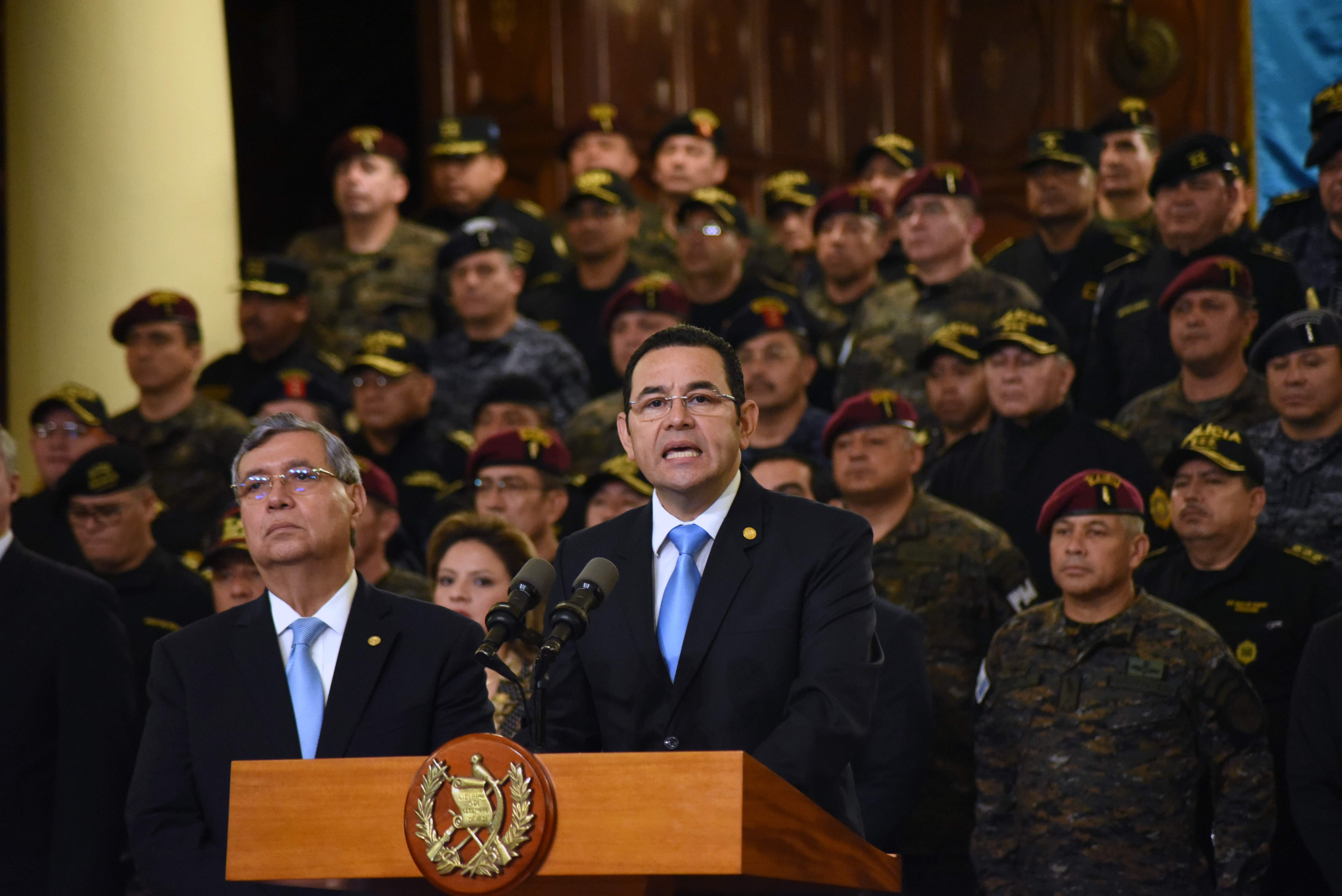 Guatemalan President Jimmy Morales delivers a press conference in Guatemala City on August 31, 2018. - Morales announced Friday Guatemala will not renew the mandate of a UN anti-corrption mission, which he accused of improper interference on internal matters of the country. (Photo by ORLANDO ESTRADA / AFP)