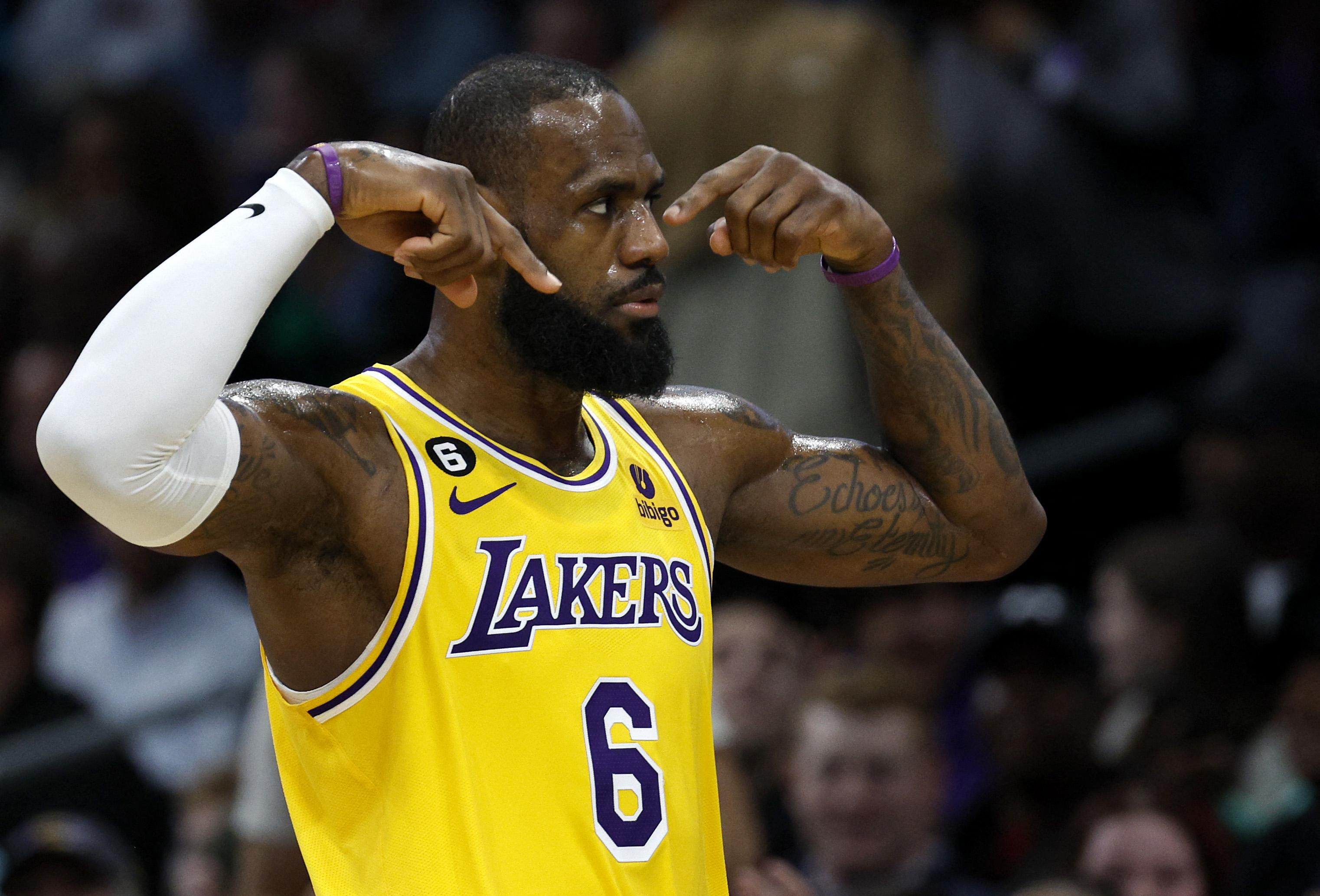 (FILES) In this file photo taken on January 2, 2023 LeBron James #6 of the Los Angeles Lakers reacts during the second quarter of the game against the Charlotte Hornets at Spectrum Center in Charlotte, North Carolina. - LeBron James, blessed with unparalleled basketball skills, exceptional longevity and unafraid to use the platform of NBA superstardom, has forged a unique destiny in his quest to be the best player of all time.
On February 7, 2023 he became the top scorer in NBA history after passing the mark Kareem Abdul-Jabbar had held since April 5, 1984 -- more than eight months before James was born -- James continues to write his legend. (Photo by Jared C. Tilton / GETTY IMAGES NORTH AMERICA / AFP)