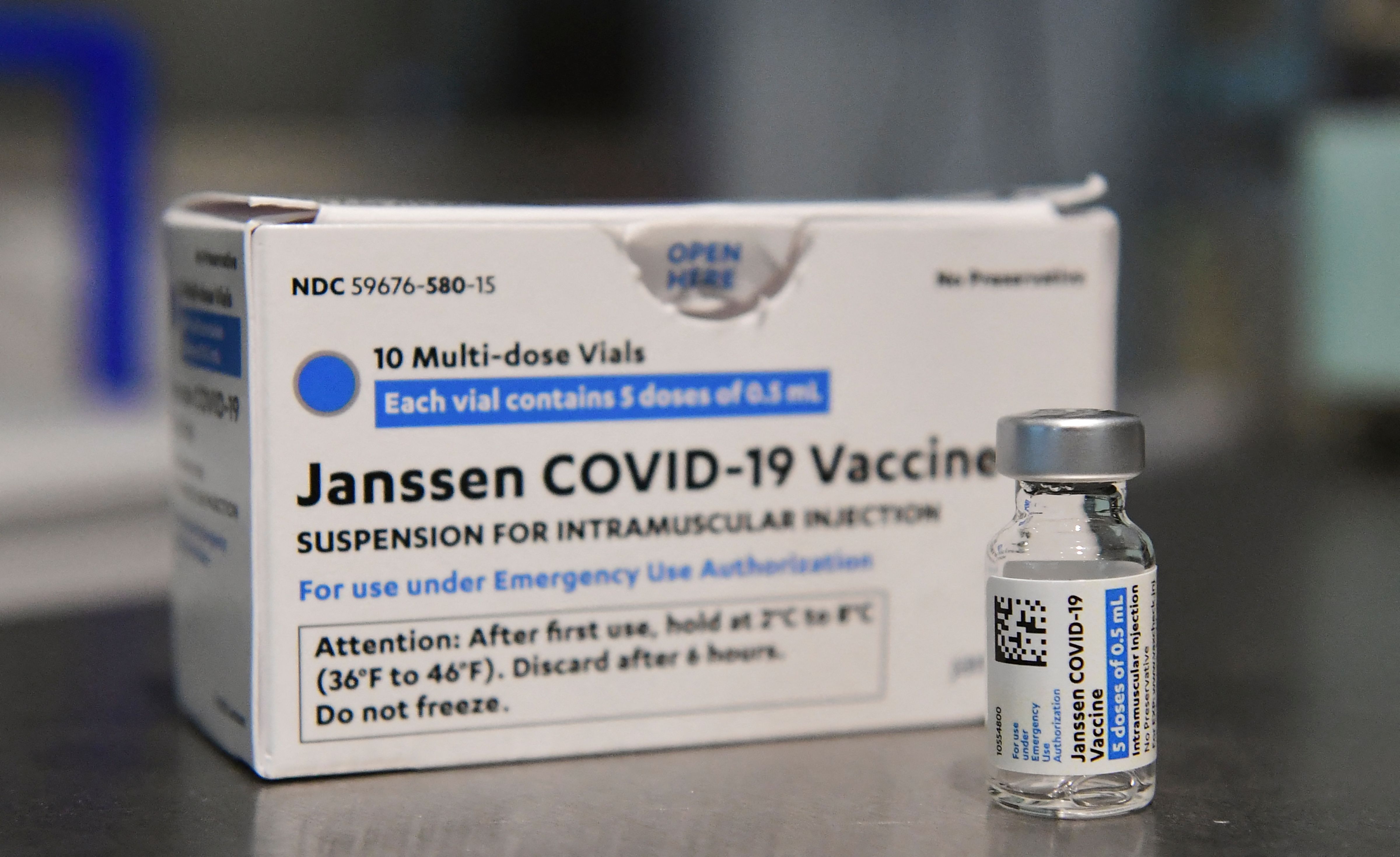 (FILES) In this file photo taken on May 07, 2021, Johnson & Johnson�s Janssen Covid-19 vaccines are seen on a table in Los Angeles, California. - Johnson & Johnson said on June 10, 2021, the US Food and Drug Administration had authorized an extension for the shelf life of its Covid-19 vaccine from three months to four-and-a-half months. The news comes as millions of doses of the single-shot vaccine, which is stored at refrigerator temperatures, were in danger of expiring and being tossed. (Photo by Frederic J. BROWN / AFP)