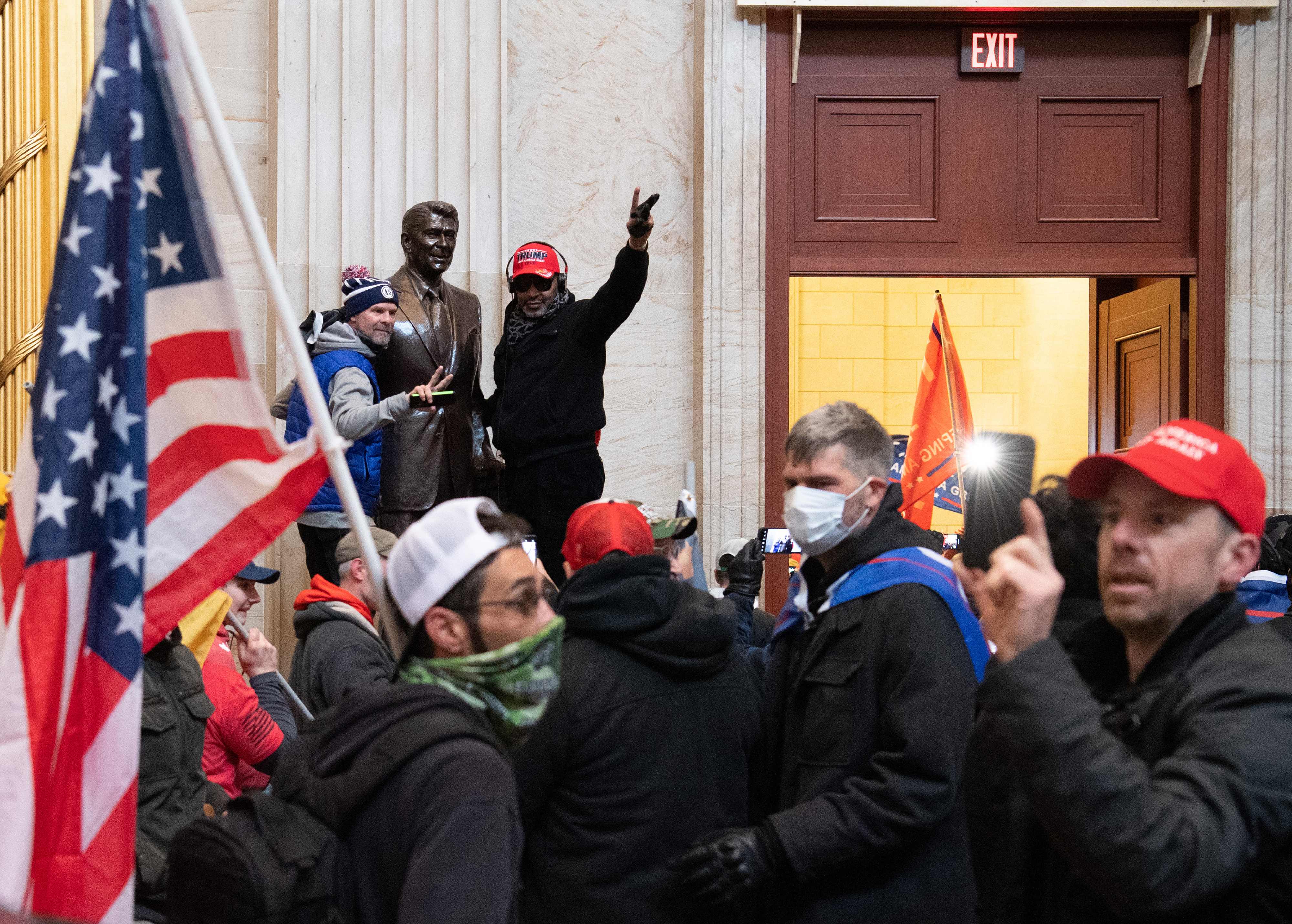 Supporters of US President Donald Trump enter the US Capitol's Rotunda on January 6, 2021, in Washington, DC. - Demonstrators breeched security and entered the Capitol as Congress debated the a 2020 presidential election Electoral Vote Certification. (Photo by SAUL LOEB / AFP)