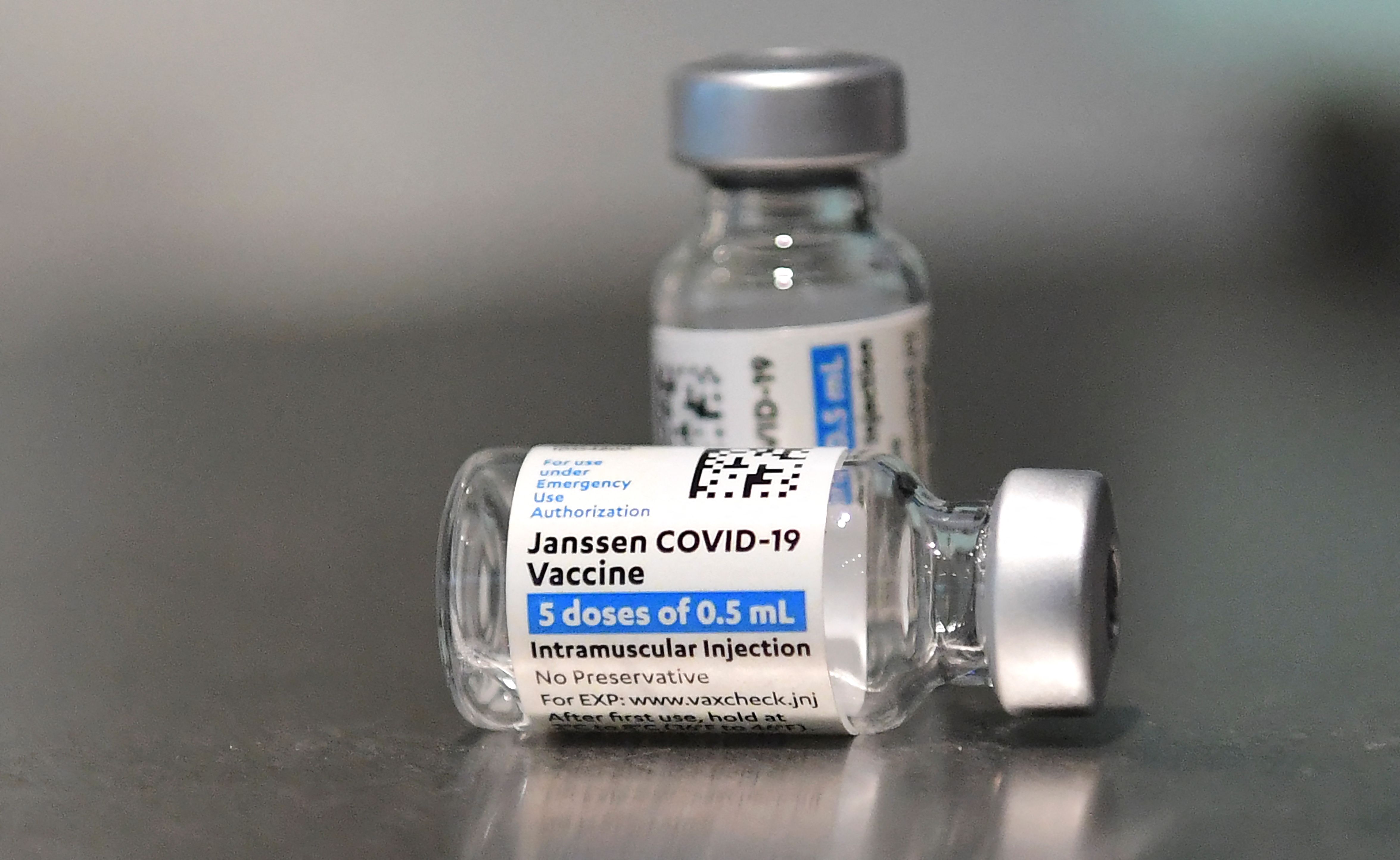 (FILES) In this file photo taken on May 07, 2021, Johnson & Johnson�s Janssen Covid-19 vaccines are seen on a table in Los Angeles, California. - Johnson & Johnson said on June 10, 2021, the US Food and Drug Administration had authorized an extension for the shelf life of its Covid-19 vaccine from three months to four-and-a-half months. The news comes as millions of doses of the single-shot vaccine, which is stored at refrigerator temperatures, were in danger of expiring and being tossed. (Photo by Frederic J. BROWN / AFP)