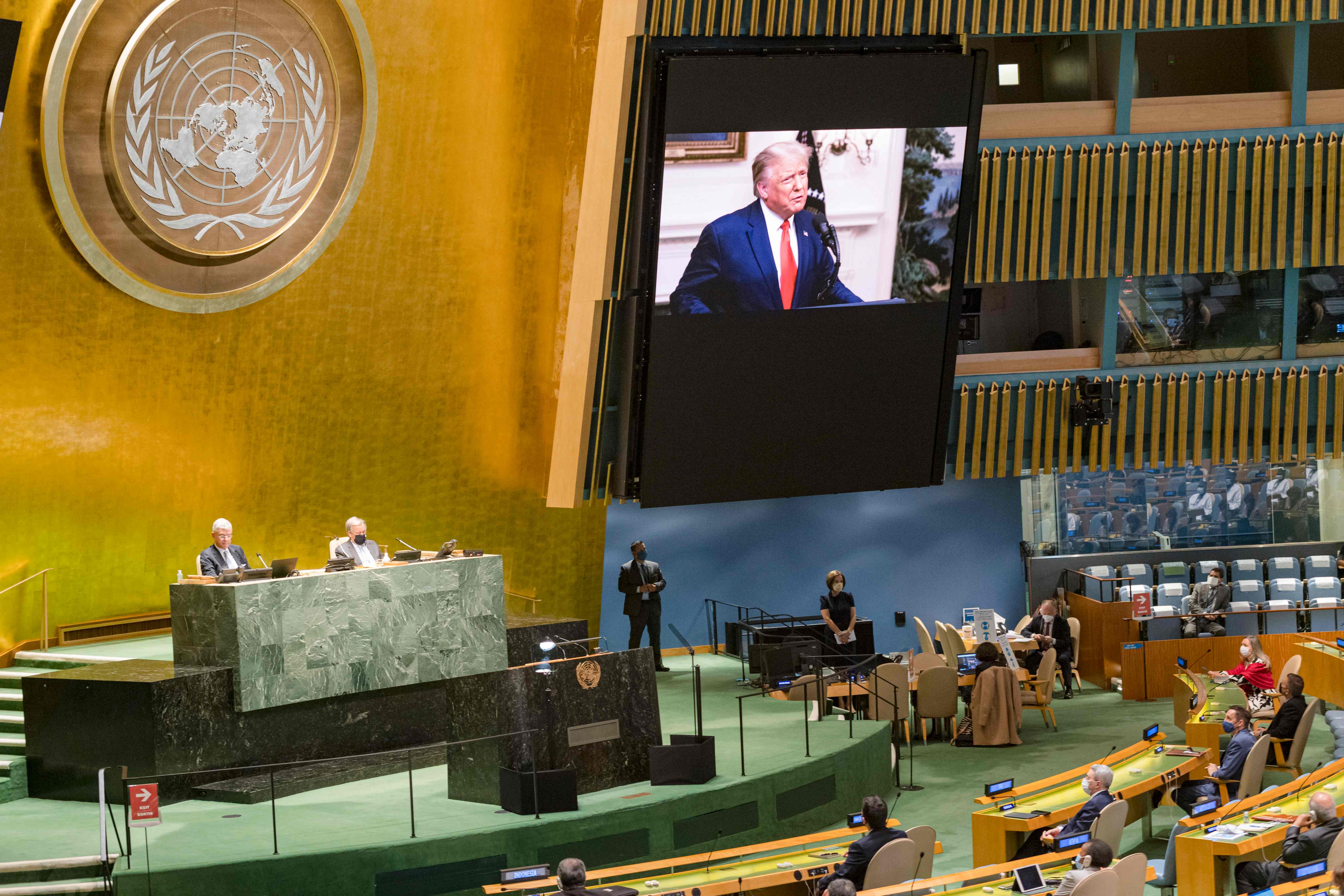 This UN handout photo shows US President Donald Trump(on screen), as he addresses the general debate of the seventy-fifth session of the United Nations General Assembly, on September 22, 2020 at the UN in New York. - US President Donald Trump angrily cast blame on China over the coronavirus pandemic in an address on Tuesday before the United Nations, whose chief warned against a new "Cold War" between the two powers. (Photo by Rick BAJORNAS / UNITED NATIONS / AFP) / RESTRICTED TO EDITORIAL USE - MANDATORY CREDIT "AFP PHOTO /UNITED NATIONS/RICK BAJORNAS/HANDOUT " - NO MARKETING - NO ADVERTISING CAMPAIGNS - DISTRIBUTED AS A SERVICE TO CLIENTS