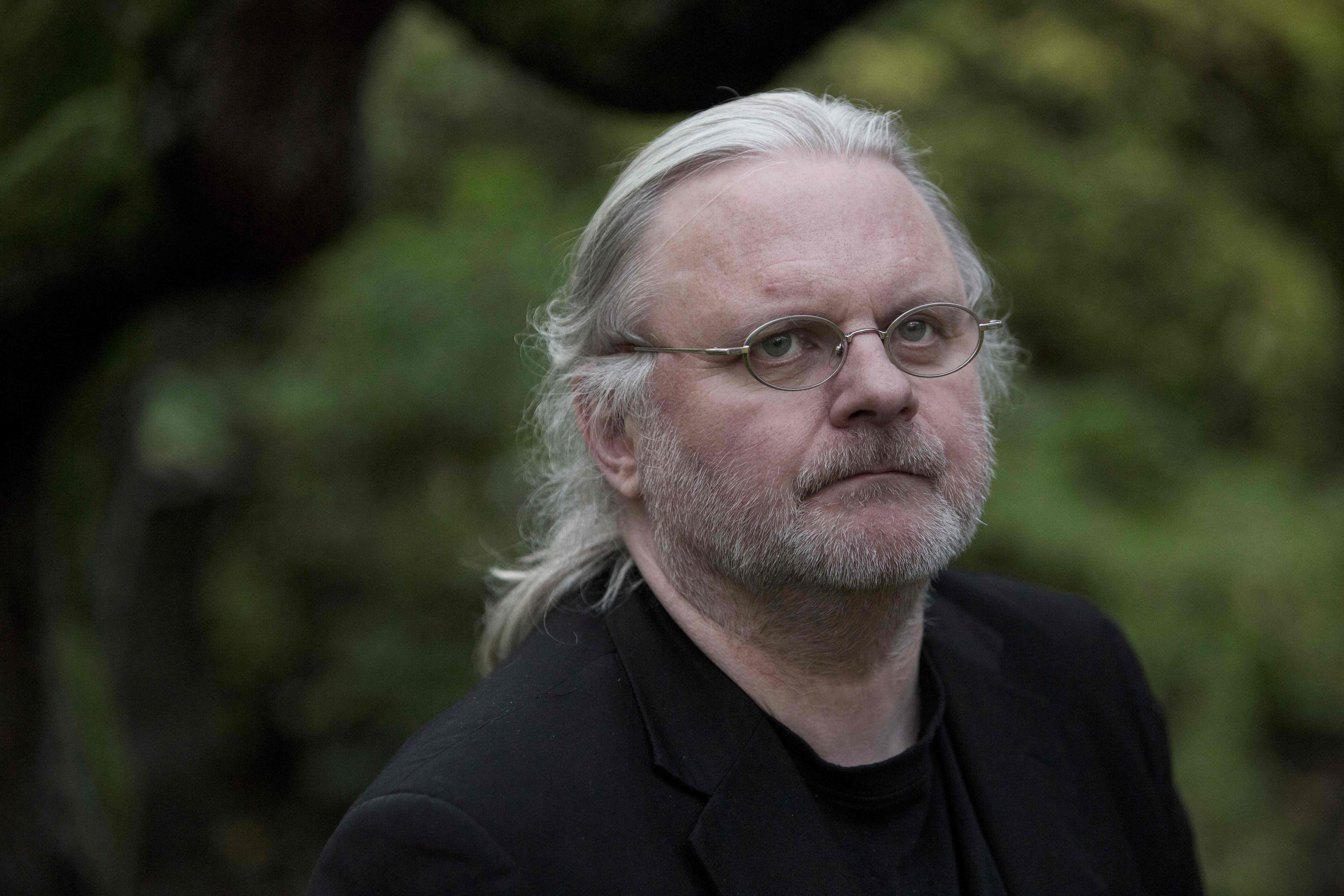 (FILES) Norwegian playwright Jon Fosse poses for a photo at the state's honorary residence for deserving artists, Grotten in Oslo on December 8, 2015. The Swedish Academy on October 5, 2023 awarded the Nobel literature prize to Norwegian playwright Jon Fosse, whose plays are among the most widely staged of any contemporary playwright in Europe. (Photo by Ole Berg-Rusten / NTB / AFP) / Norway OUT
