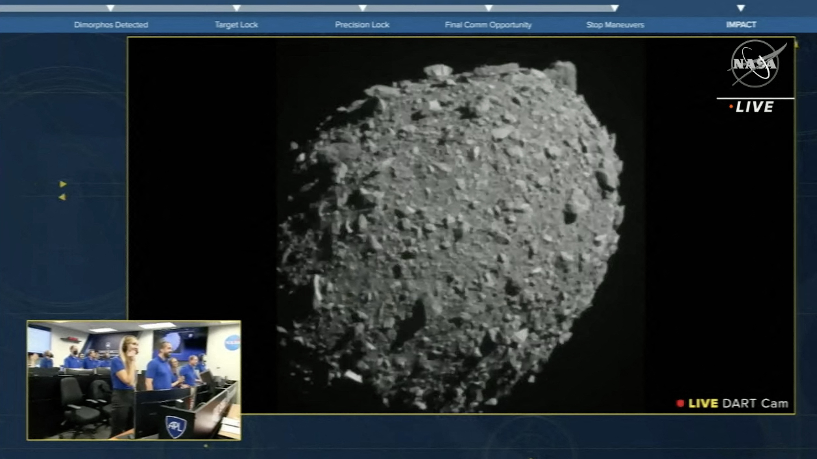 This screengrab made from NASA live feed on September 26, 2022, shows Dimorphos just before the Double Asteroid Redirection Test (DART) made impact with the asteroid, as watched by the NASA team (bottom L) at DART headquarters in Laurel, Maryland. (Photo by NASA / AFP) / RESTRICTED TO EDITORIAL USE - MANDATORY CREDIT "AFP PHOTO / NASA " - NO MARKETING - NO ADVERTISING CAMPAIGNS - DISTRIBUTED AS A SERVICE TO CLIENTS