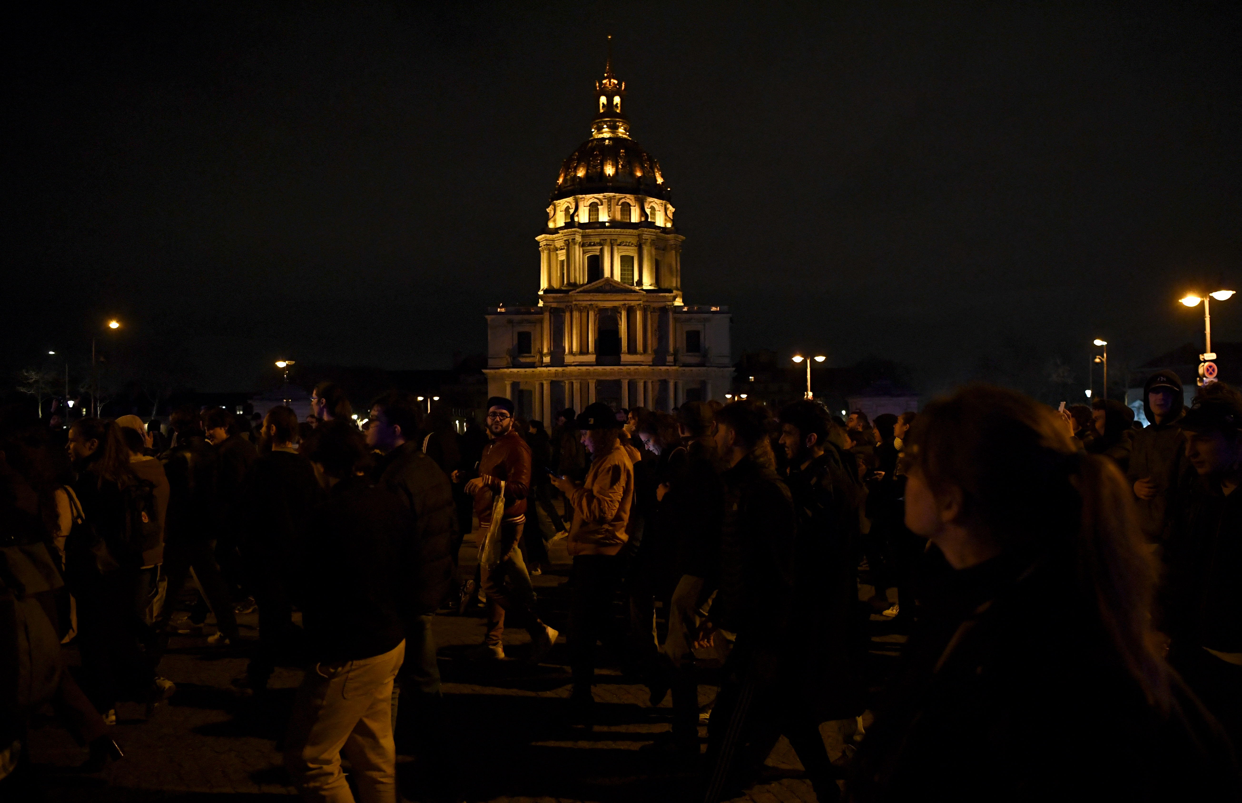 Protestors march through Place Vauban during a demonstration a few days after the government pushed a pensions reform through parliament without a vote, using the article 49,3 of the constitution in Paris on March 20, 2023. - The French government survived two no-confidence motions in parliament on March 20, 2023 but still faces intense pressure over its handling of a controversial pensions reform. (Photo by Christophe ARCHAMBAULT / AFP)