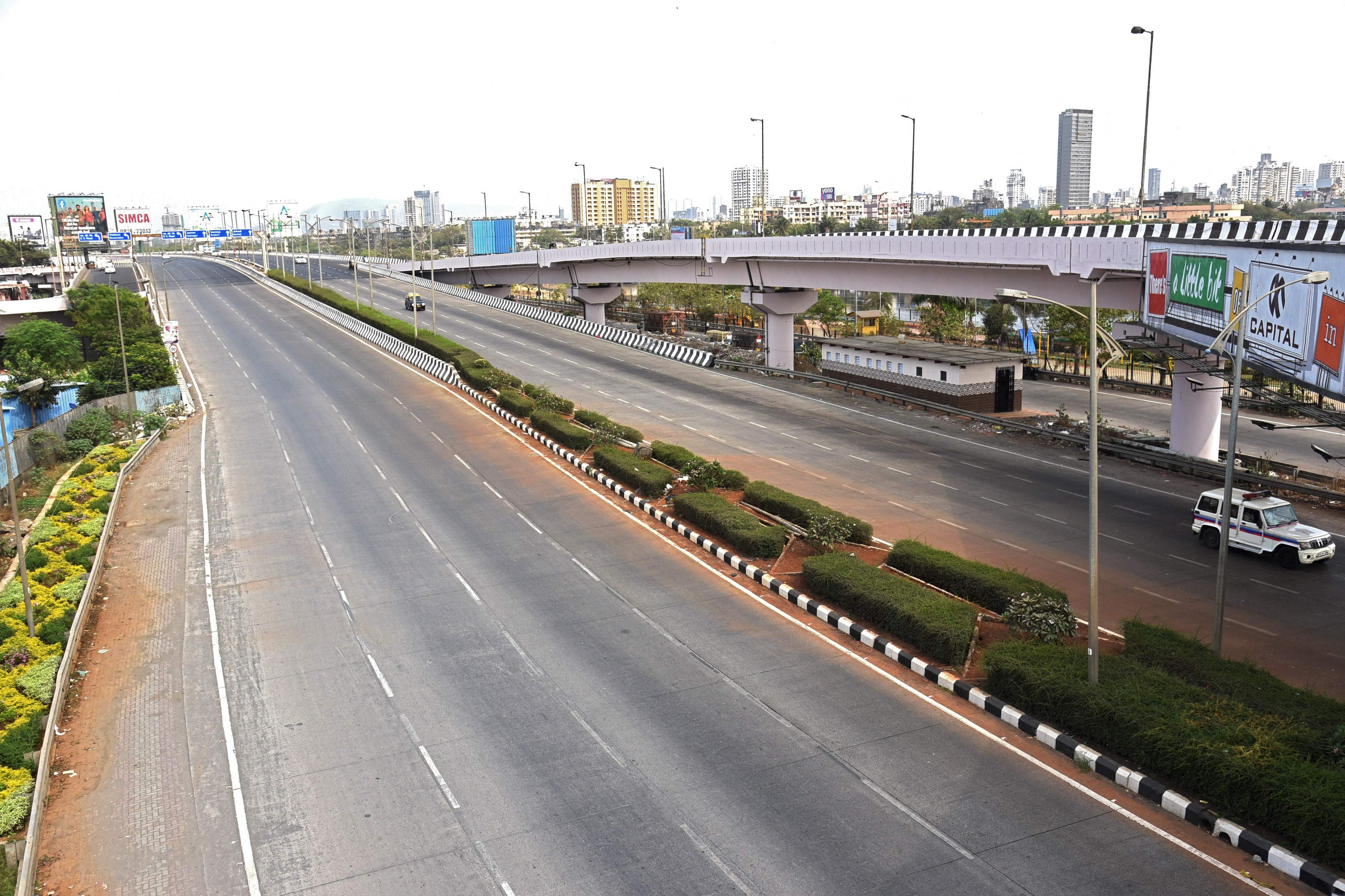 Deserted roads are seen on Bandra during a weekend lockdown imposed by the state government amidst rising Covid-19 coronavirus cases, in Mumbai on April 10, 2021. (Photo by Sujit Jaiswal / AFP)