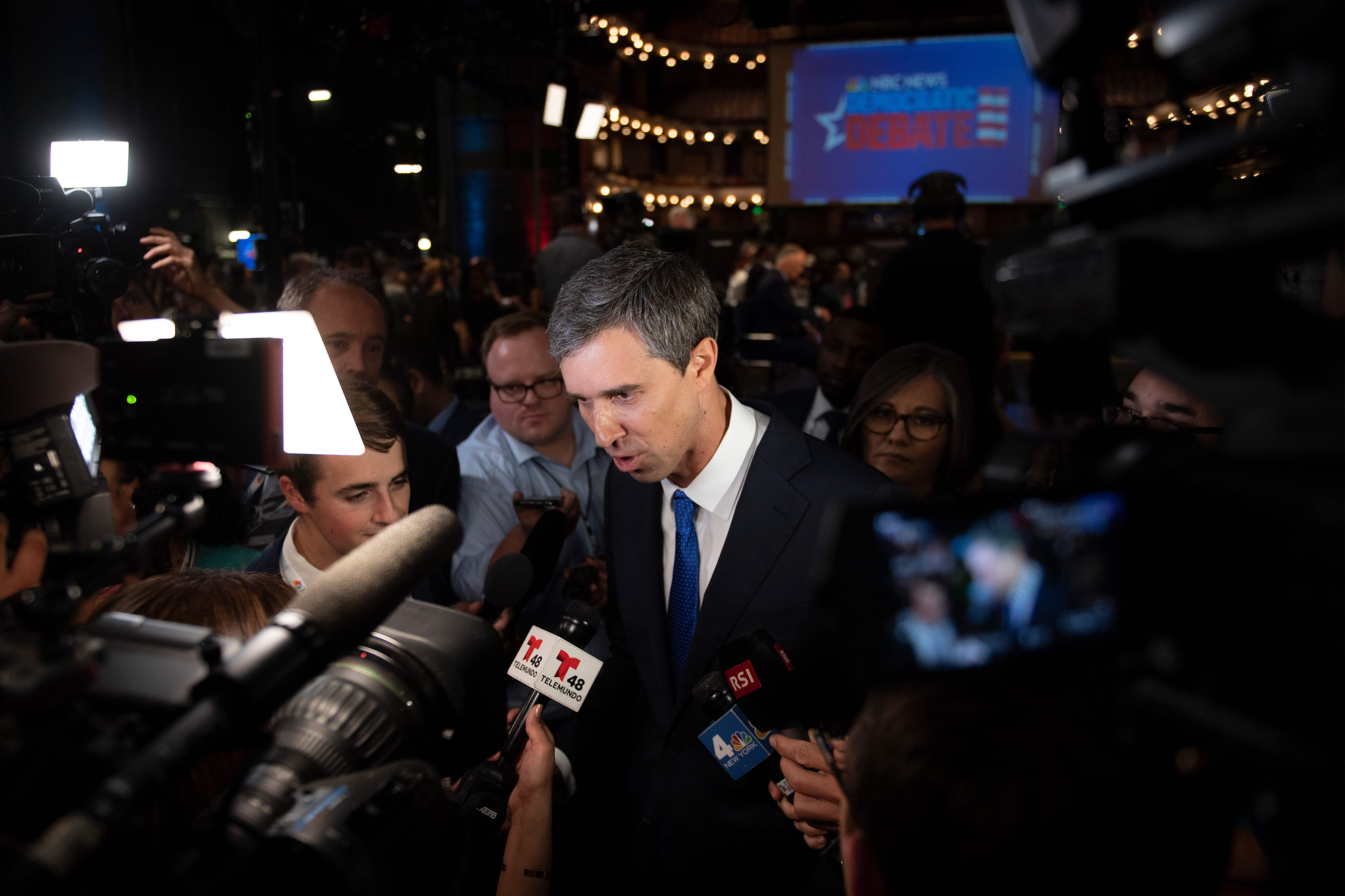 Democratic presidential hopeful former US Representative for Texas' 16th congressional district Beto O'Rourke speaks with the press in the Spin Room after participating in the first Democratic primary debate of the 2020 presidential campaign season hosted by NBC News at the Adrienne Arsht Center for the Performing Arts in Miami, Florida, June 26, 2019. (Photo by JIM WATSON / AFP)