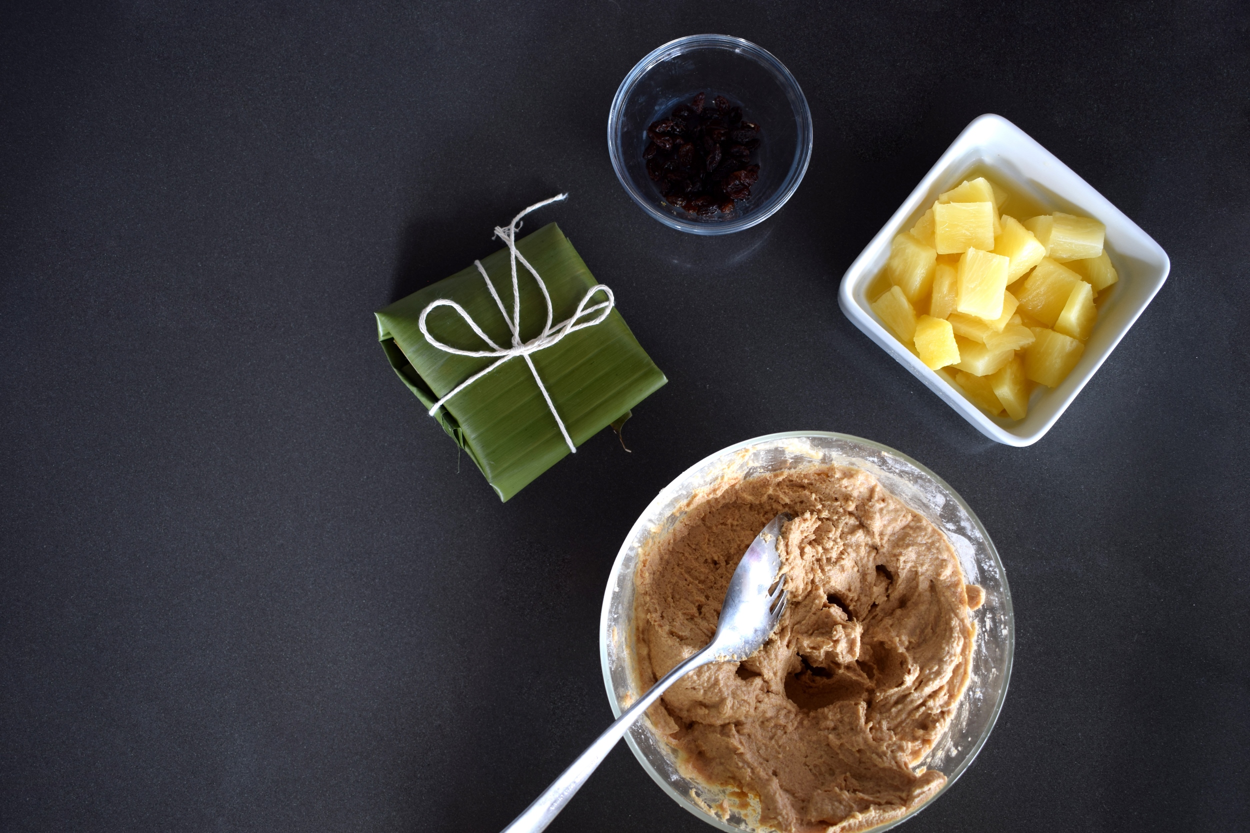 Tamales dulces de piña, coco y pasas La Nación