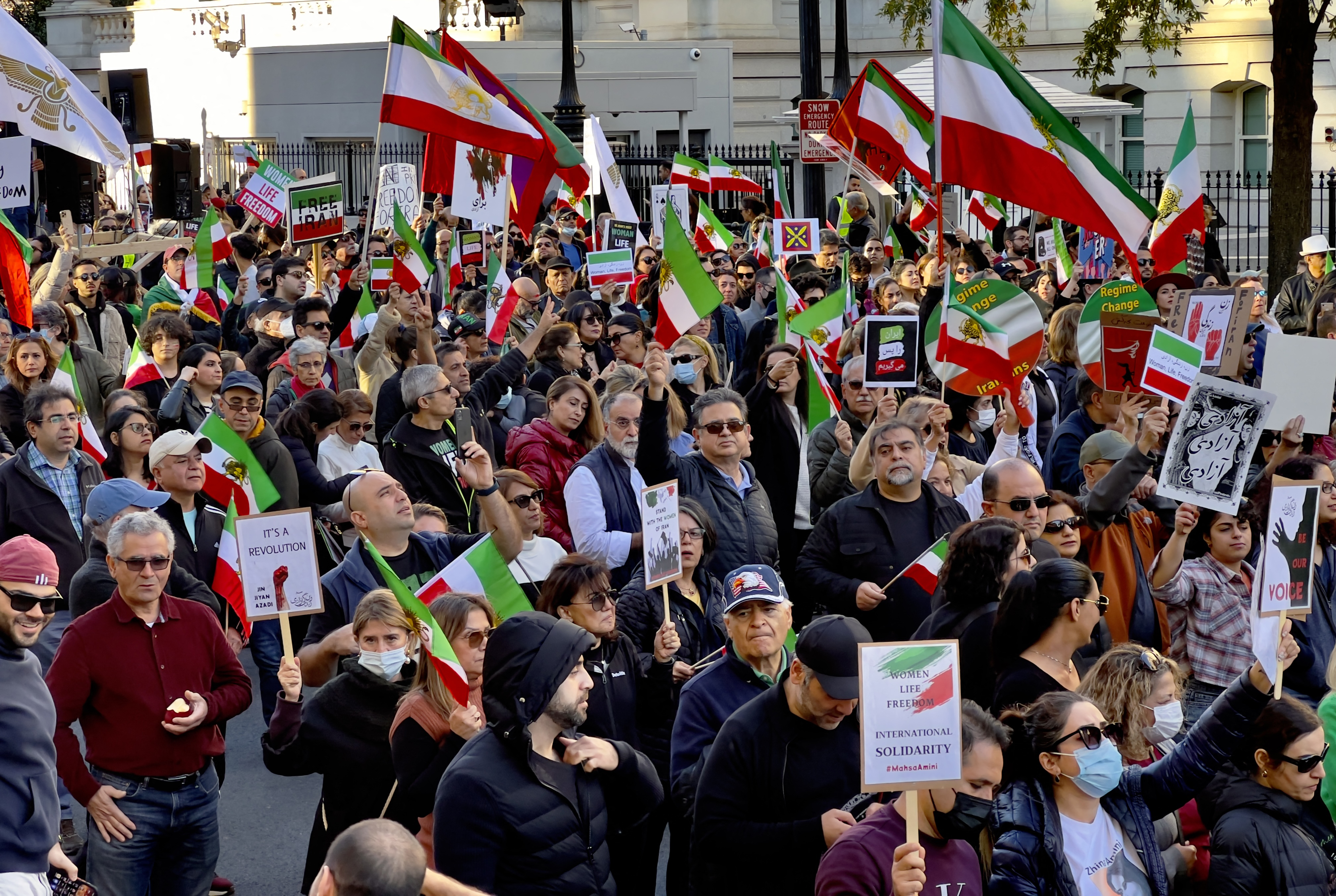 Demonstrators in solidarity with protesters in Iran march in Washington, DC, on October 29, 2022. - Iran has been rocked by protests since 22-year-old Mahsa Amini's death on September 16, three days after she was arrested. (Photo by Daniel SLIM / AFP)