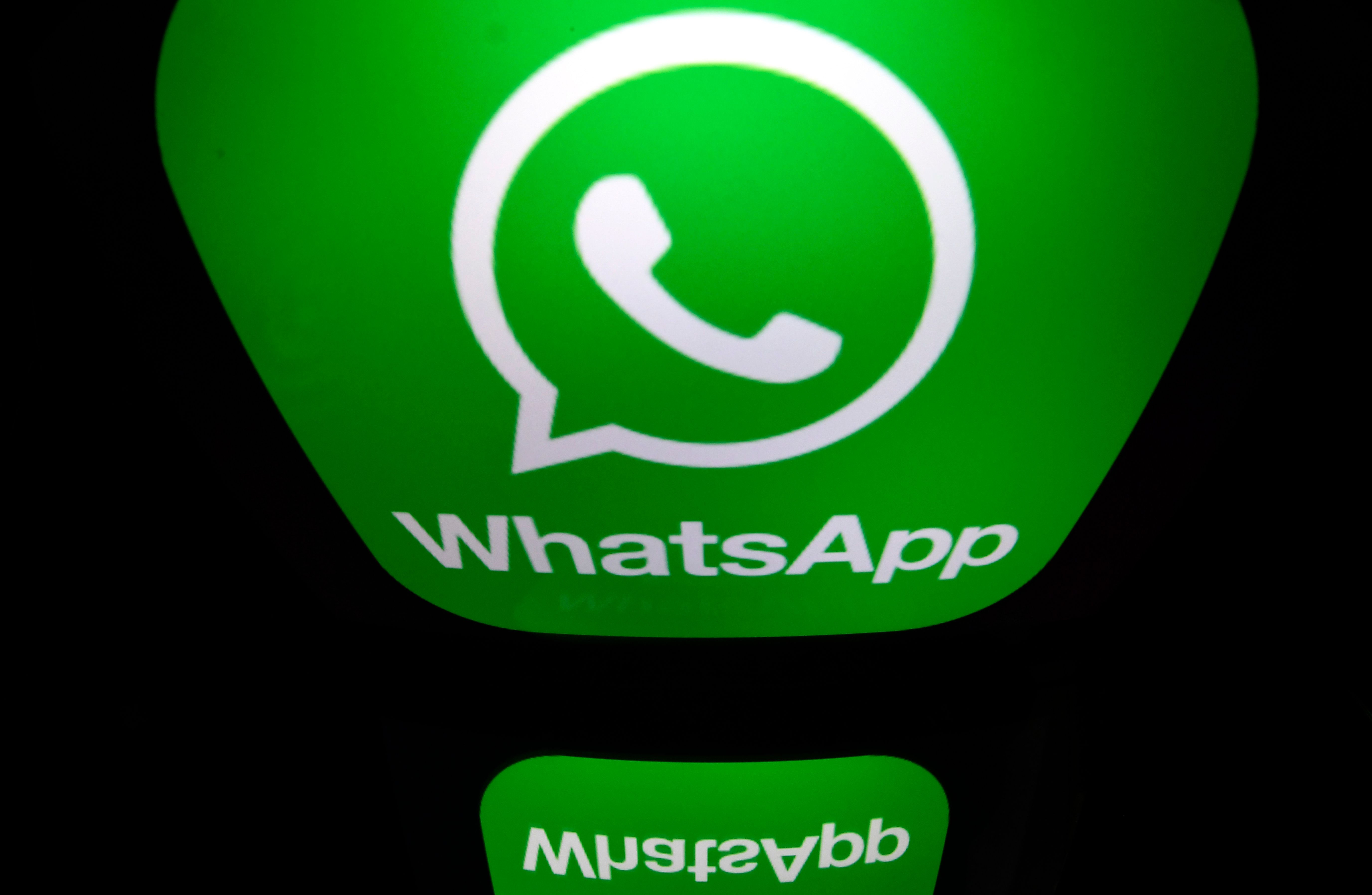 (FILES) In this file photo taken on December 28, 2016 a picture taken in Paris shows the logo of WhatsApp mobile messaging service. - WhatsApp on January 15, 2021 delayed a data-sharing change as users worried about privacy fled the Facebook-owned messaging service and flocked to rivals Telegram and Signal.
"We're now moving back the date on which people will be asked to review and accept the terms," WhatsApp said in a blog post. (Photo by Lionel BONAVENTURE / AFP)