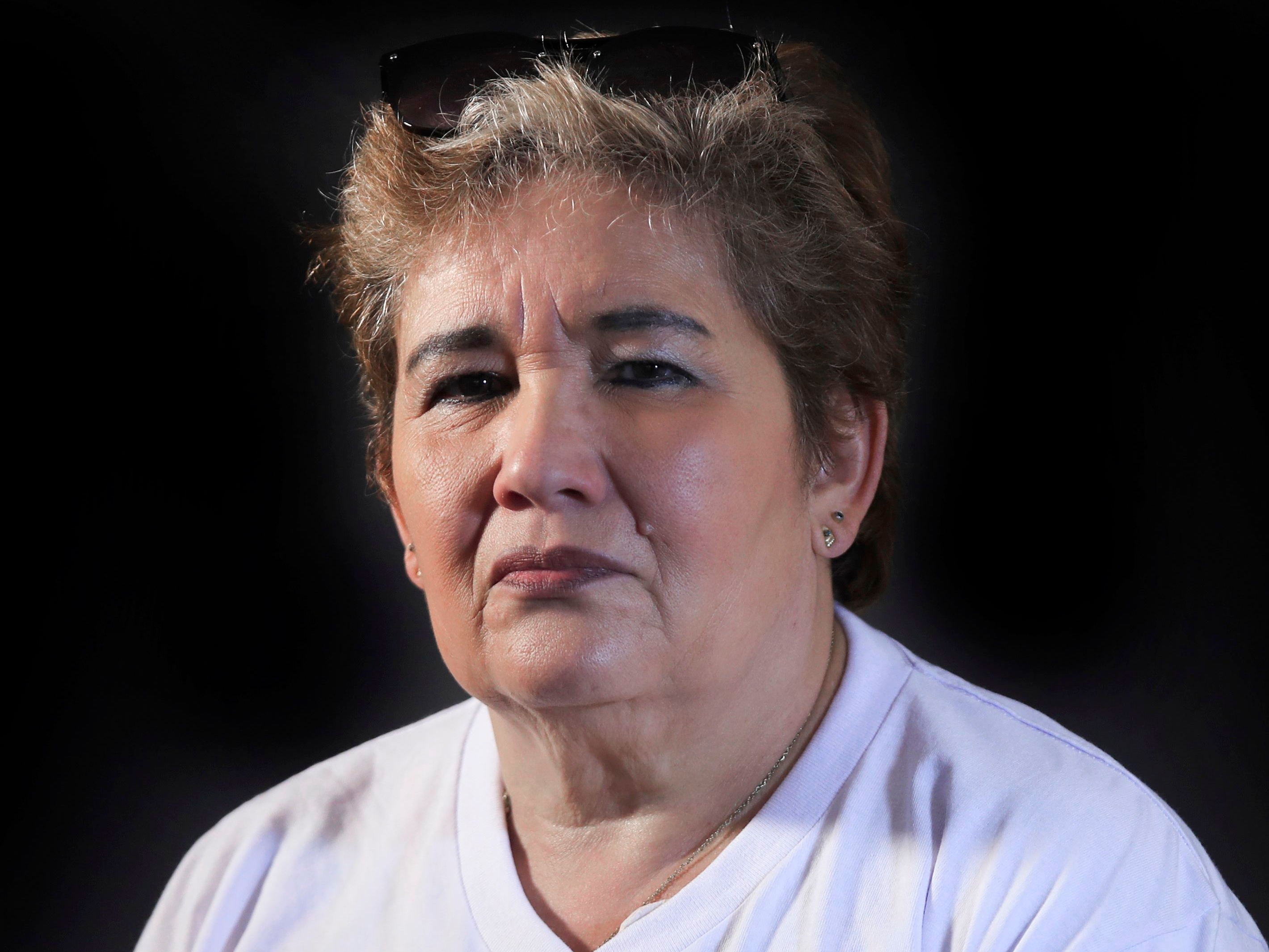 Carmenza Gomez, member of the Mothers of False Positives (Mafapo) civil organization, poses for a picture in Bogota, on February 7, 2020. - During the nine-year reconstruction of her son's extrajudicial execution Carmenza Gomez uncovered a "rotten pot" in the Colombian army and now demands justice and the truth about his crime. Without imagining it, Carmenza began to unveil the biggest scandal in the history of the Colombian military: the "false positives", executions of civilians at the hands of the military who presented them as combat casualties to swell the results of a conflict that has bled the country to death for almost sixty years. (Photo by Daniel MUNOZ / AFP)