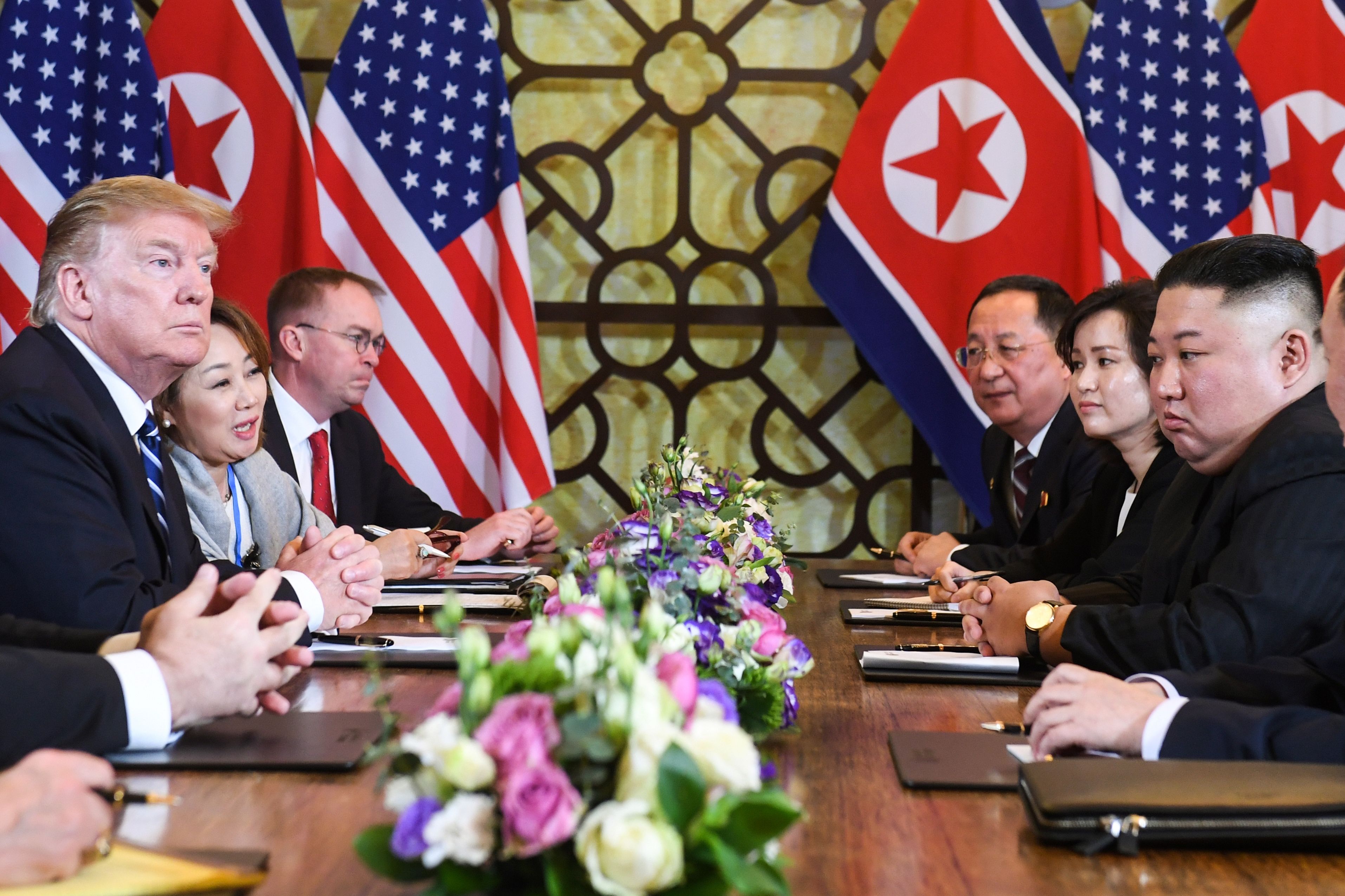 US President Donald Trump (L) and North Korea's leader Kim Jong Un (R) hold a bilateral meeting during the second US-North Korea summit at the Sofitel Legend Metropole hotel in Hanoi on February 28, 2019. (Photo by Saul LOEB / AFP)