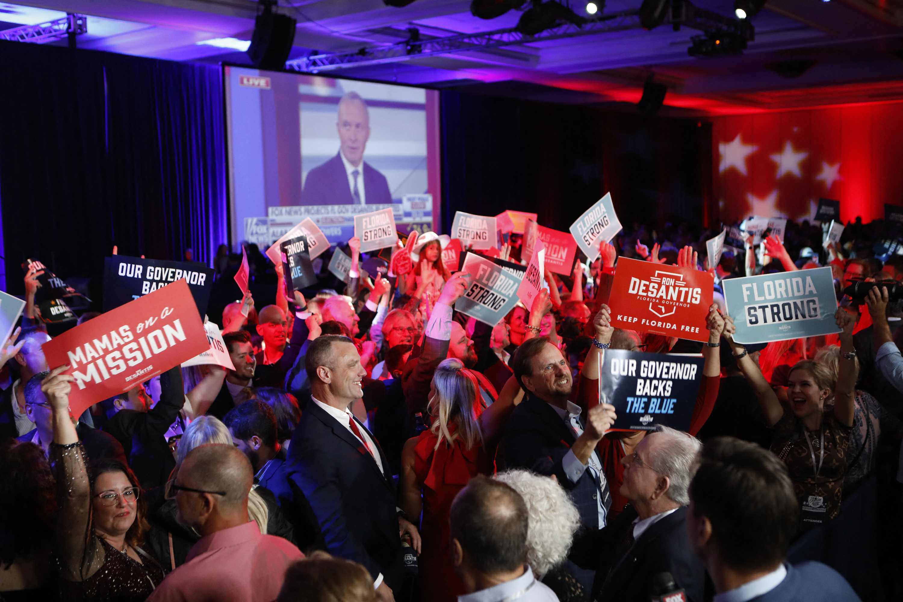 TAMPA, FL - NOVEMBER 08: Supporters of Florida Gov. Ron DeSantis celebrate his re-election victory over Democratic gubernatorial challenger Rep. Charlie Crist during his election night watch party at the Tampa Convention Center on November 8, 2022 in Tampa, Florida. DeSantis was the projected winner by a double-digit lead. Octavio Jones/Getty Images/AFP (Photo by Octavio Jones / GETTY IMAGES NORTH AMERICA / Getty Images via AFP)