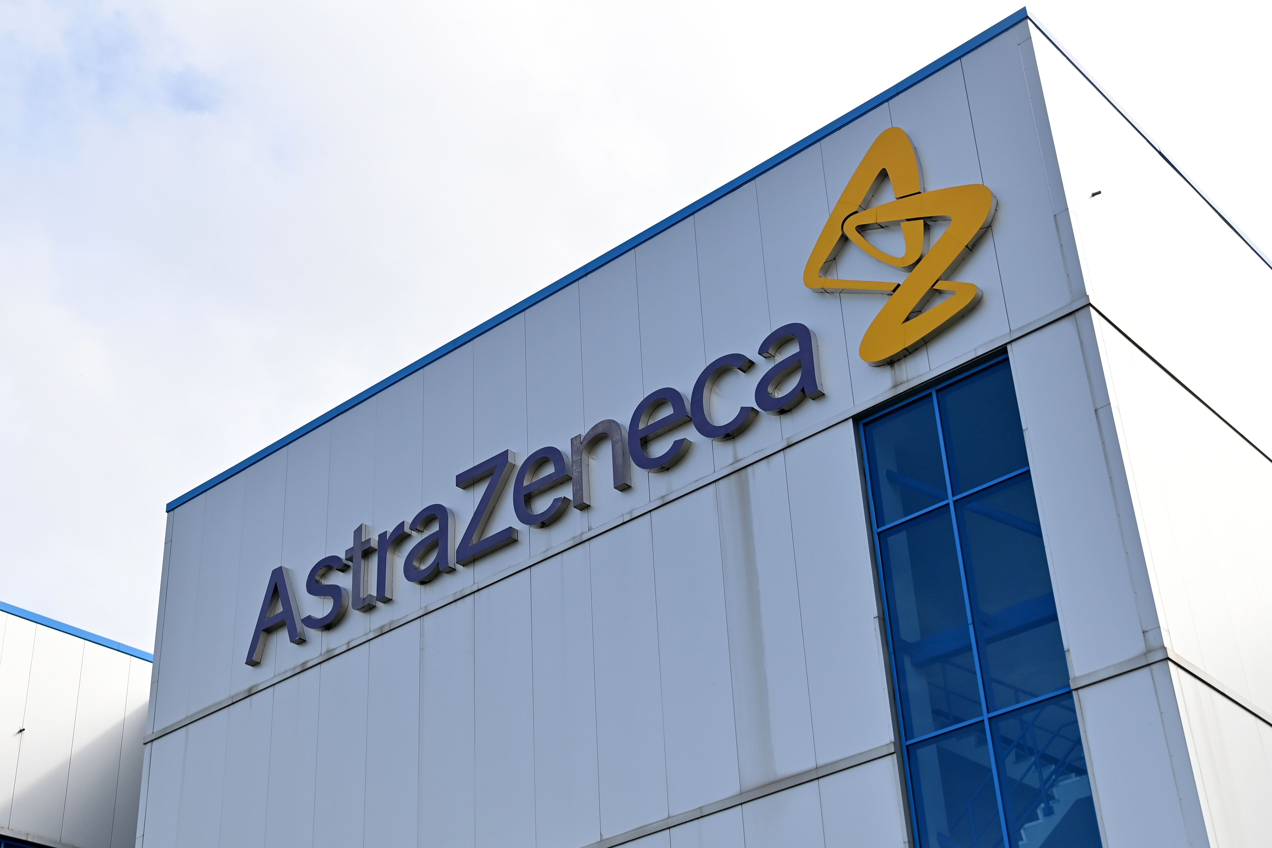 (FILES) In this file photo taken on July 21, 2020 a general view is pictured of the offices of British-Swedish multinational pharmaceutical and biopharmaceutical company AstraZeneca PLC in Macclesfield, Cheshire. - Pharmaceutical company AstraZeneca said on September 8, 2020 that it had "voluntarily paused" a randomized clinical trial of its coronavirus vaccine in what it called a routine action after a volunteer developed an unexplained illness. (Photo by Paul ELLIS / AFP)