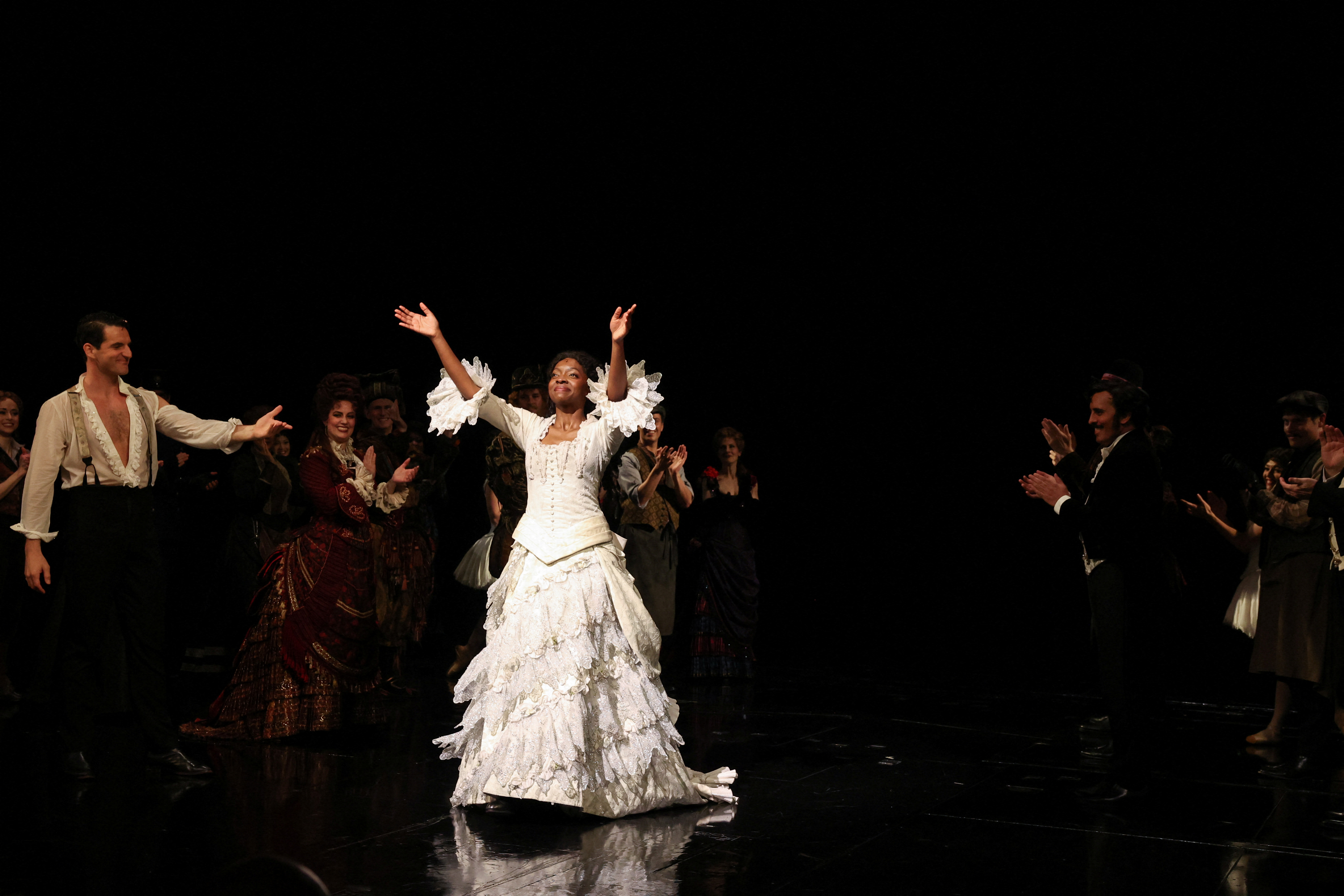 The actress Emilie Kouatchou saying goodbye on stage after her last performance.  (PHOTO: REUTERS/Caitlin Ochs)