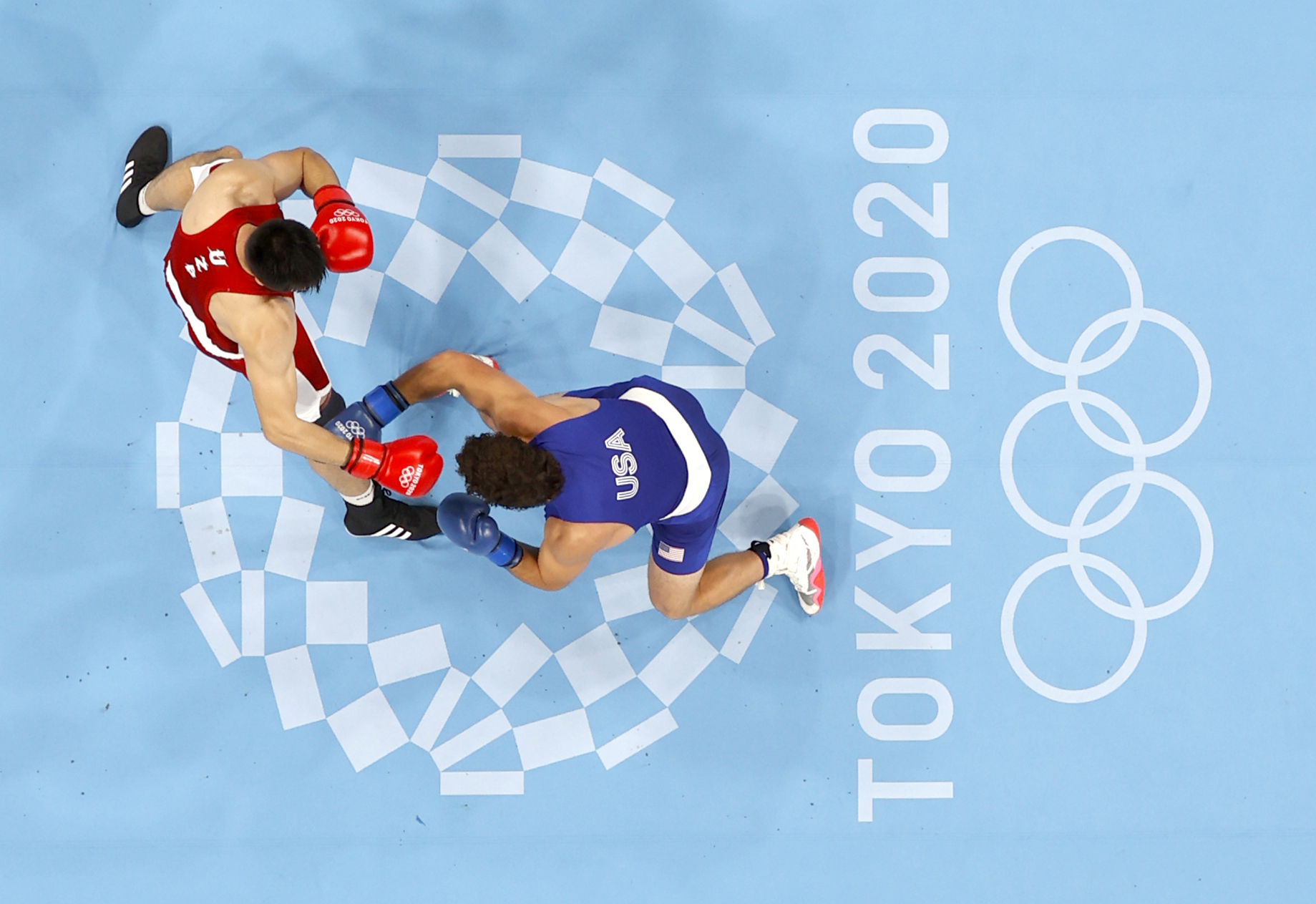 Tokyo 2020 Olympics - Boxing - Men's Super Heavyweight - Final - Kokugikan Arena - Tokyo, Japan - August 8, 2021. Bakhodir Jalolov of Uzbekistan in action against Richard Torrez of the United States REUTERS/Ueslei Marcelino