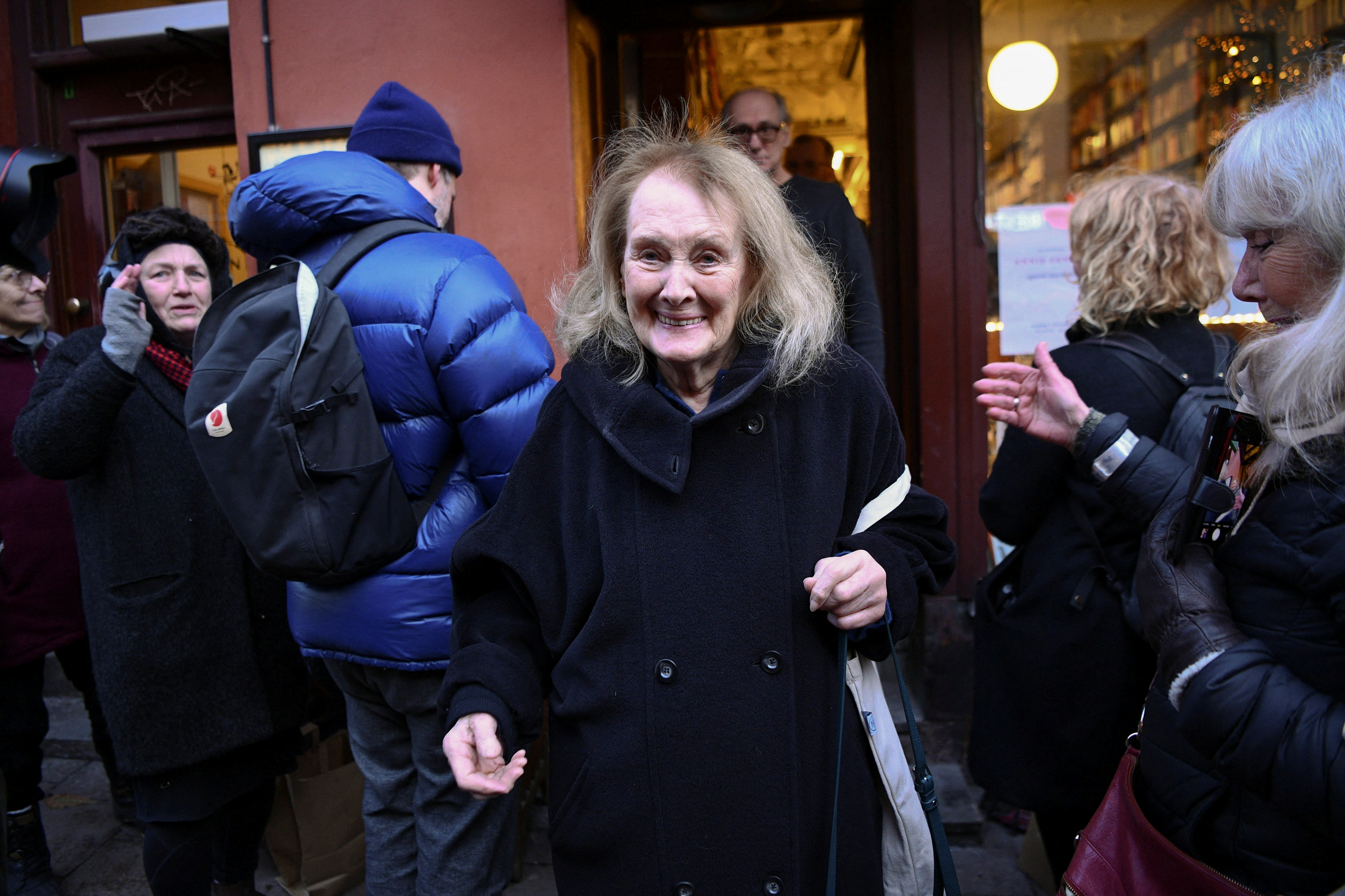 Annie Ernaux leaves a bookstore in Stockholm, after signing her books (Photo: TT News Agency/Tim Aro via REUTERS)