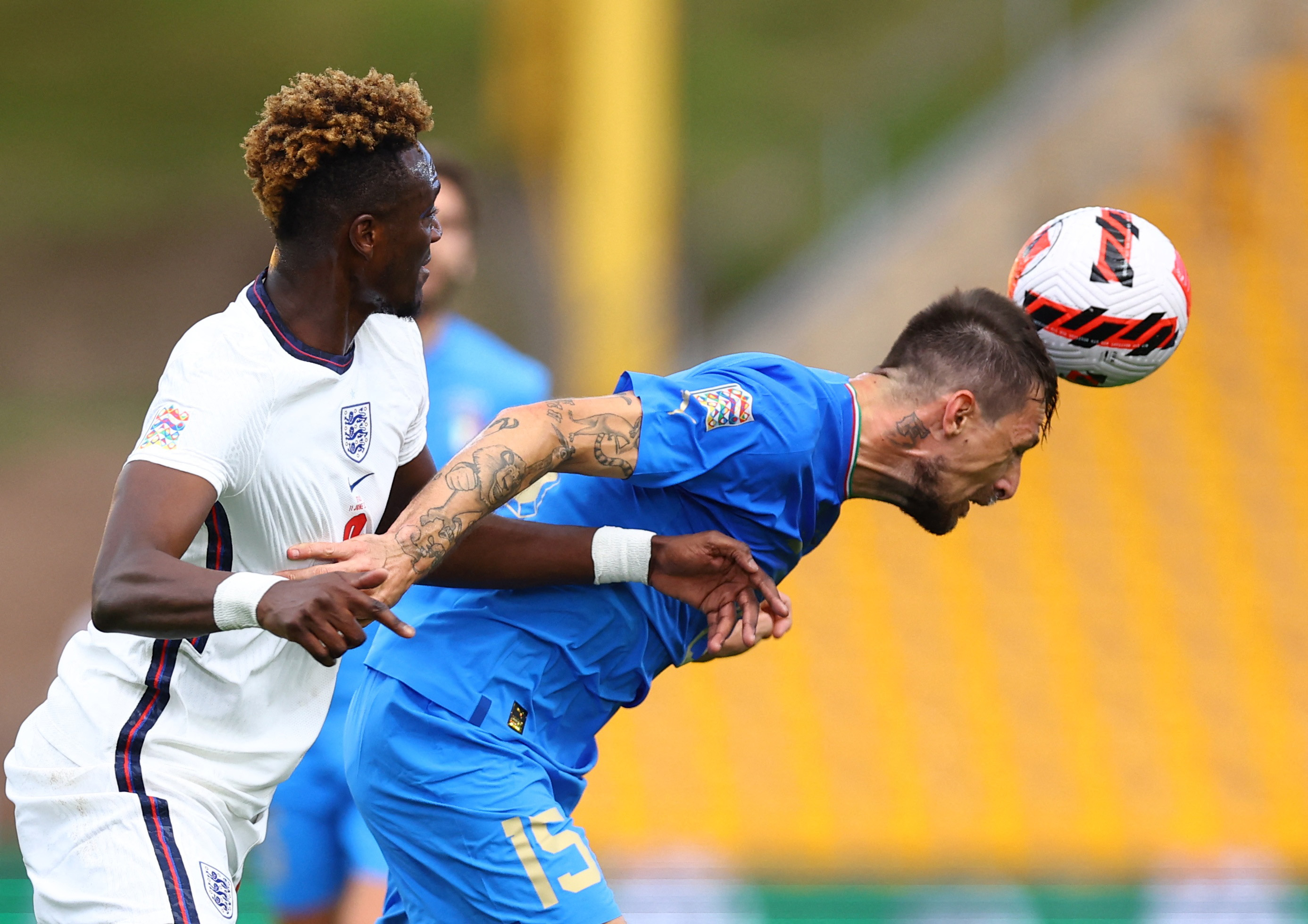Soccer Football - UEFA Nations League - Group C - England v Italy - Molineux Stadium, Wolverhampton, Britain - June 11, 2022 England's Tammy Abraham in action with Italy's Francesco Acerbi REUTERS/Hannah Mckay