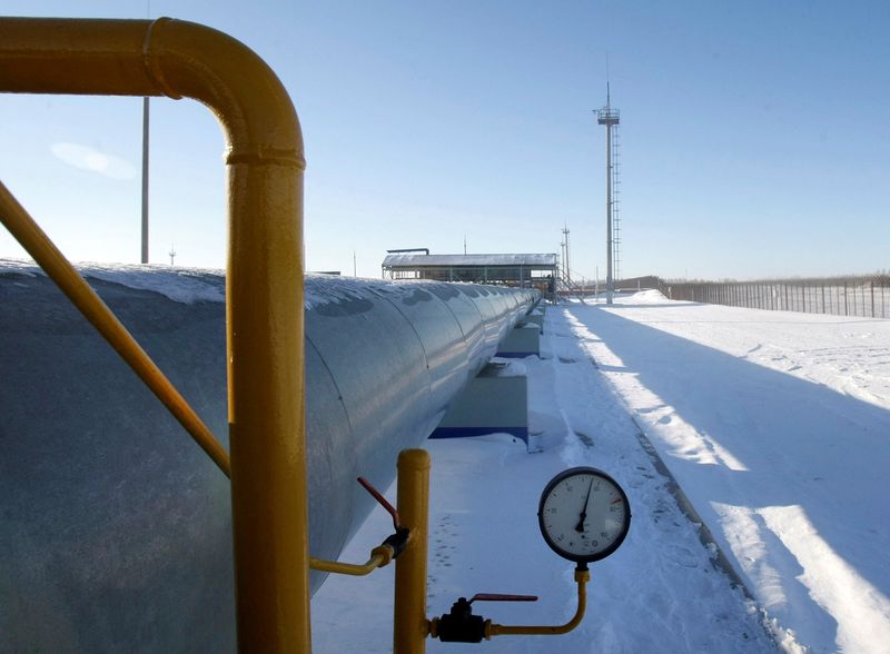 FILE PHOTO: A gas pipeline with a meter at the Sudzha pumping station of Russian gas export monopoly Gazprom.  REUTERS/Denis Sinyakov/