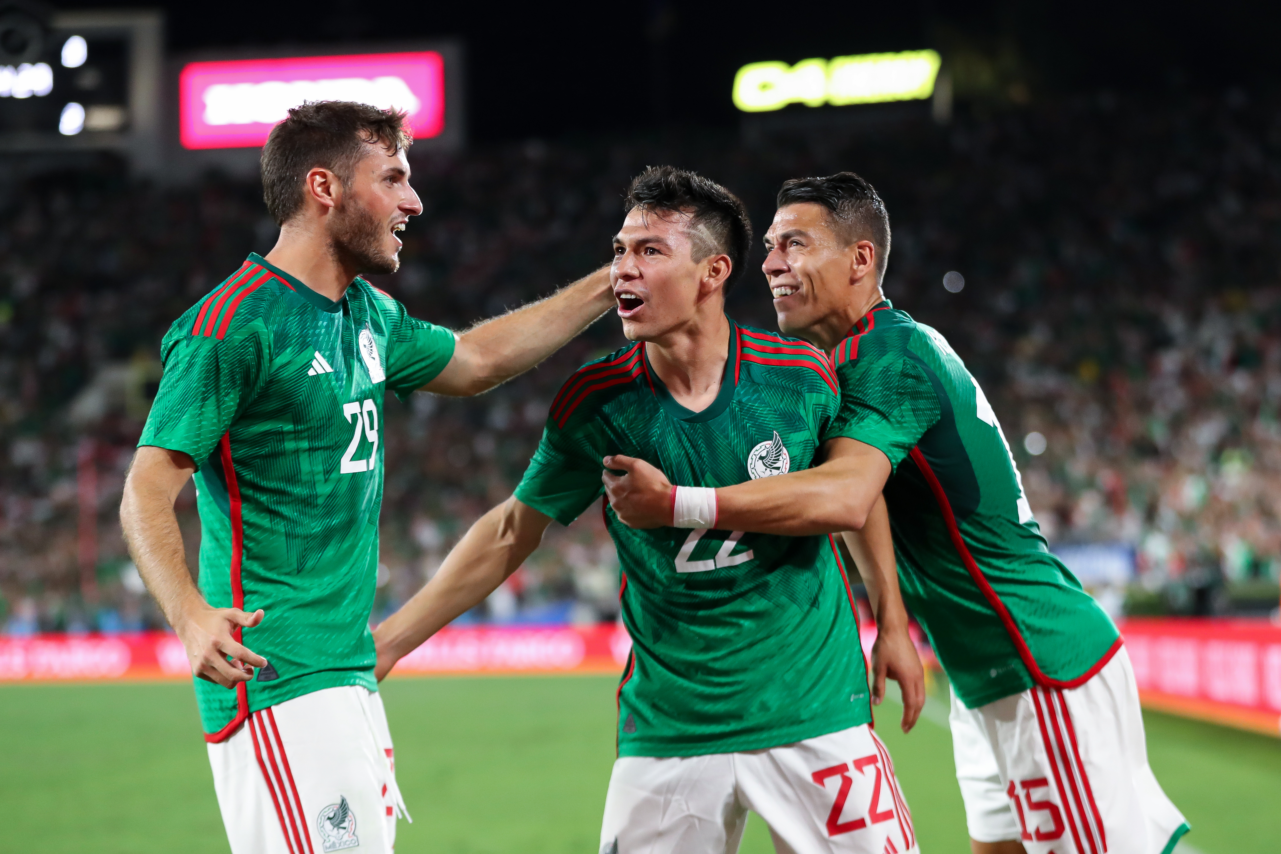 PASADENA, CA - SEPTEMBER 24: Hirving Lozano #22 of Mexico celebrates with his teammates after scoring his team's first goal during the friendly match between Mexico and Peru at Rose Bowl on September 24, 2022 in Pasadena, California. (Photo by Omar Vega/Getty Images)