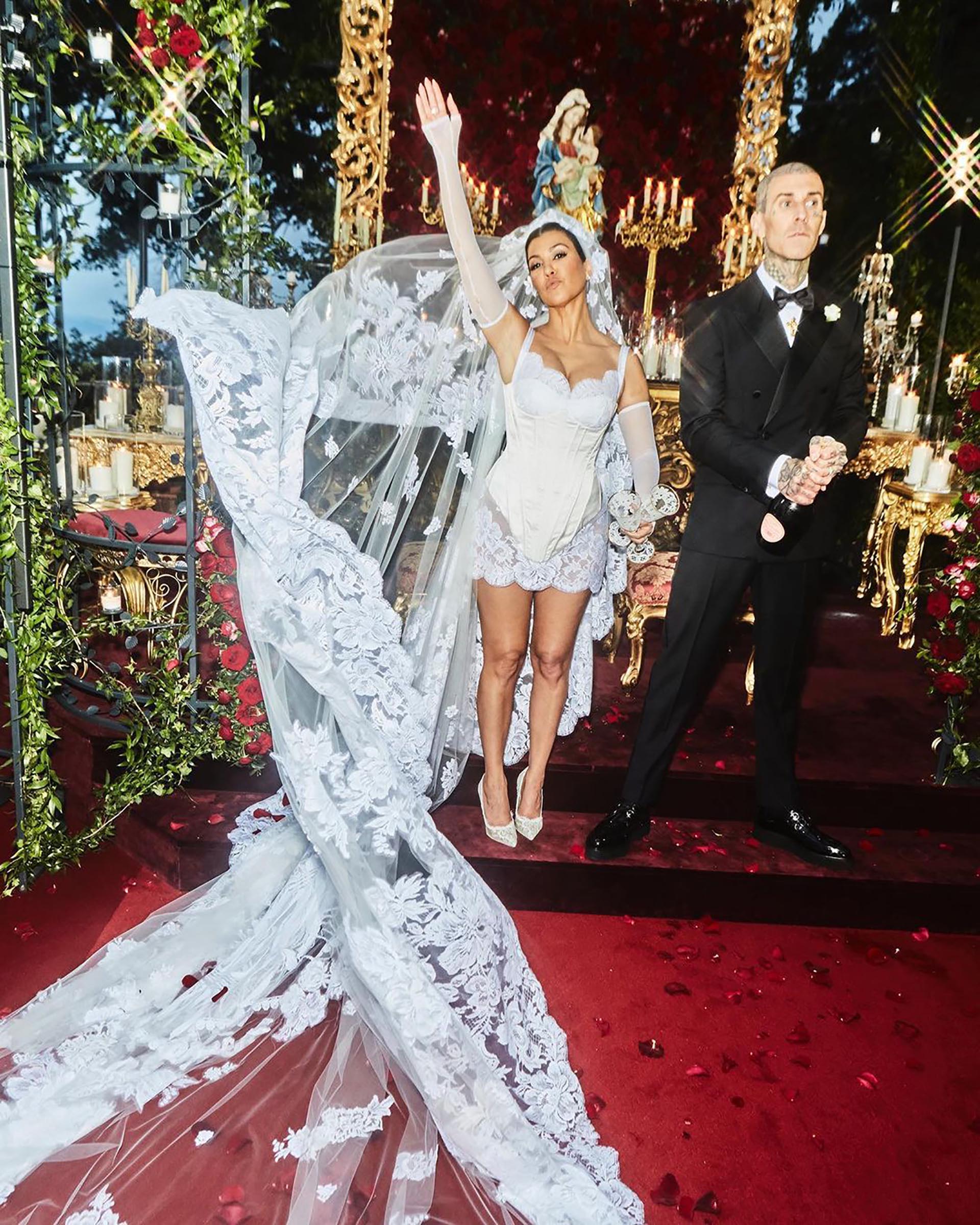 The bride and groom dressed as Dolce & Gabbana.  (@kourtneykardash)