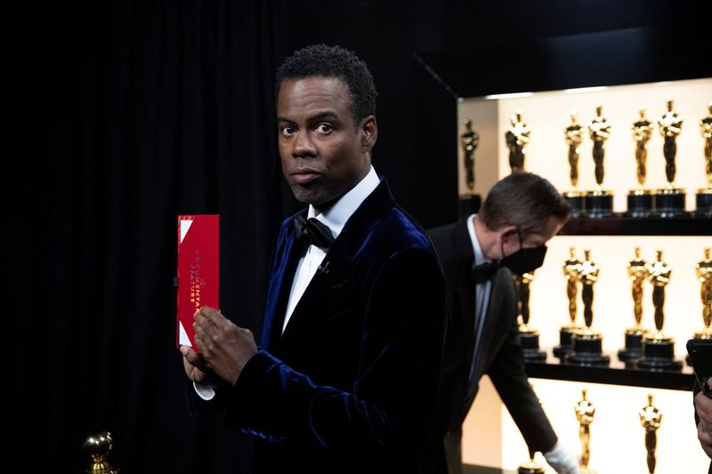 FILE PHOTO: Chris Rock backstage at the 94th Academy Awards in Hollywood, Los Angeles, California, U.S. March 27, 2022. Al Seib/AMPAS/Handout via REUTERS