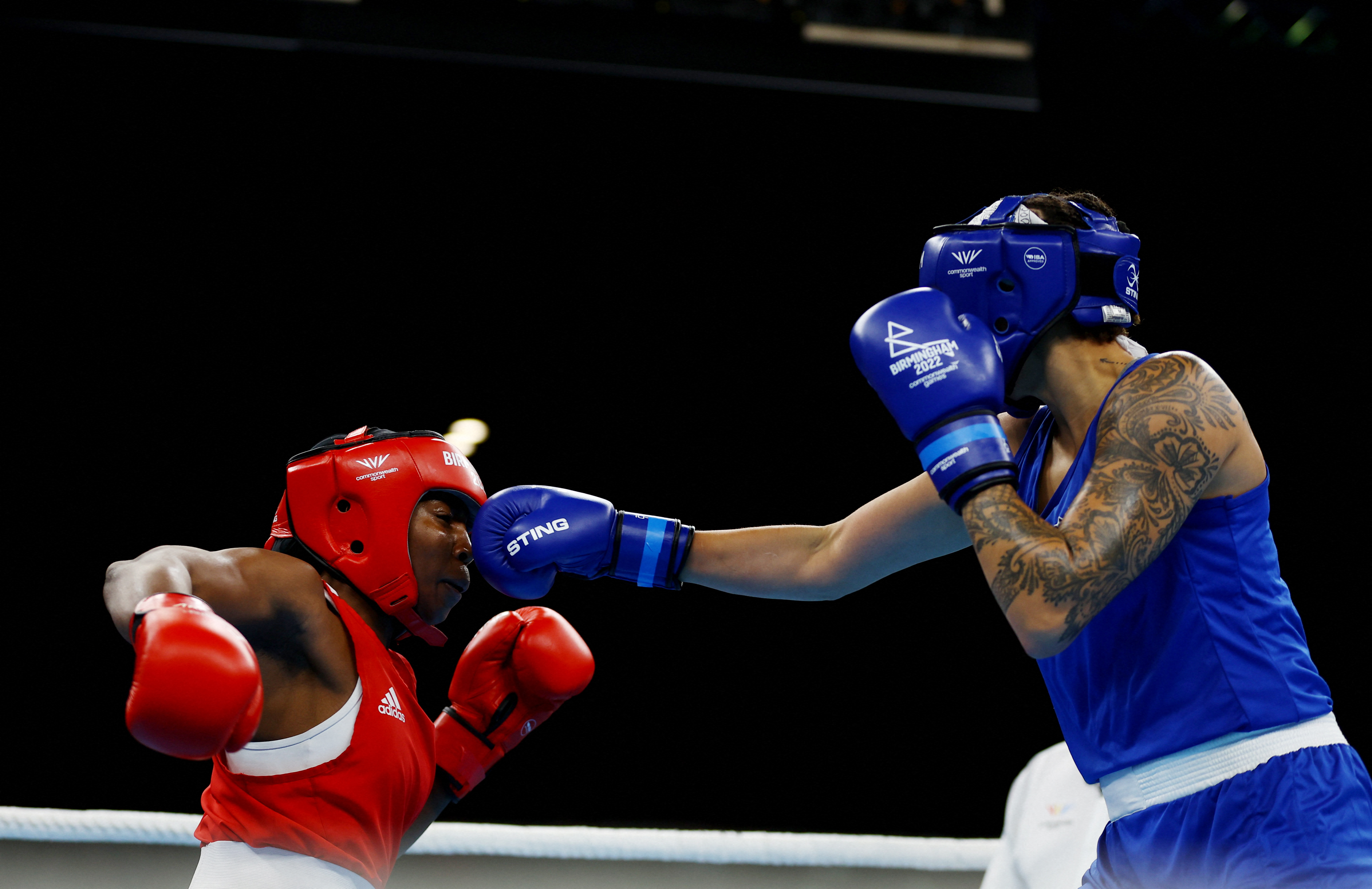 Commonwealth Games - Women’s Over 70kg-75kg (Middleweight)  - Final Bout - LocationThe NEC Hall 4, Birmingham, Britain - August 7, 2022 Canada's Tammara Thibeault in action during her fight against Mozambiques' Rady Adosinda Gramane REUTERS/Hannah Mckay