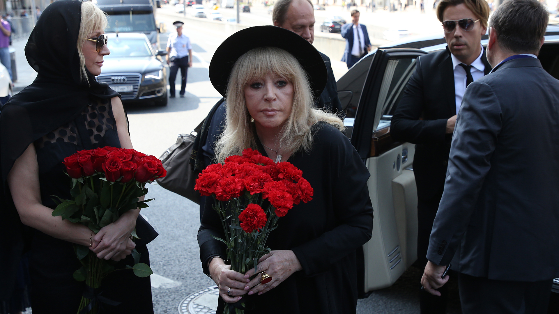 MOSCOW, RUSSIA - SEPTEMBER,2  (RUSSIA OUT) Russian pop star Alla Pugacheva (C), her husband Maksim Galkin (R) and her daughter Kristina Orbakaite (L) arrive for the funeral of Russian singer and State Duma Deputy Joseph Kobzon on September 2, 2018 in Moscow, Russia. The famous Soviet era singer Jozeph Kobzon died in Moscow at the age of 81. (Photo by Mikhail Svetlov/Getty Images)
