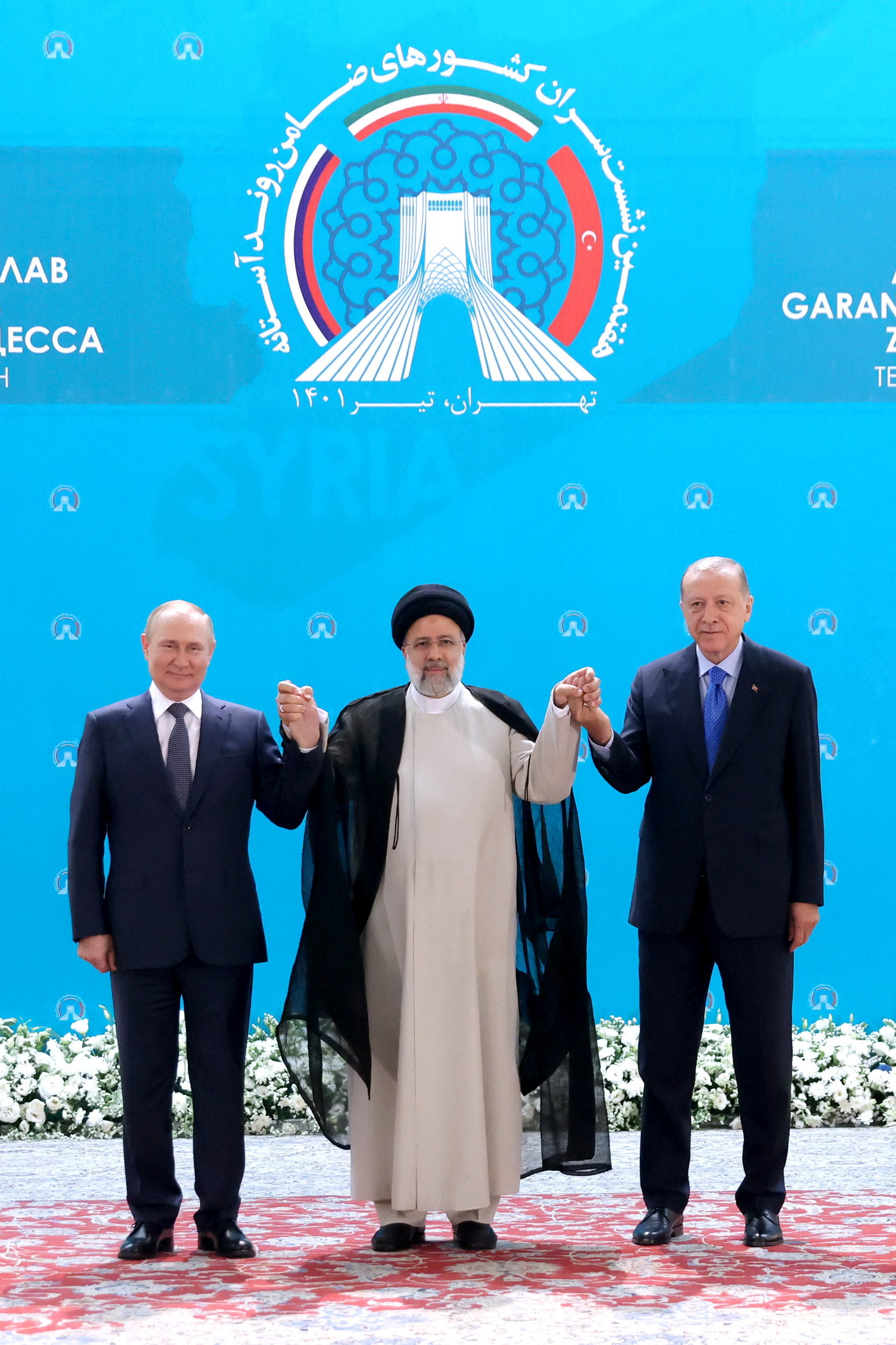 Vladimir Putin, Ibrahim Raisi e Tayyip Erdogan (Reuters)