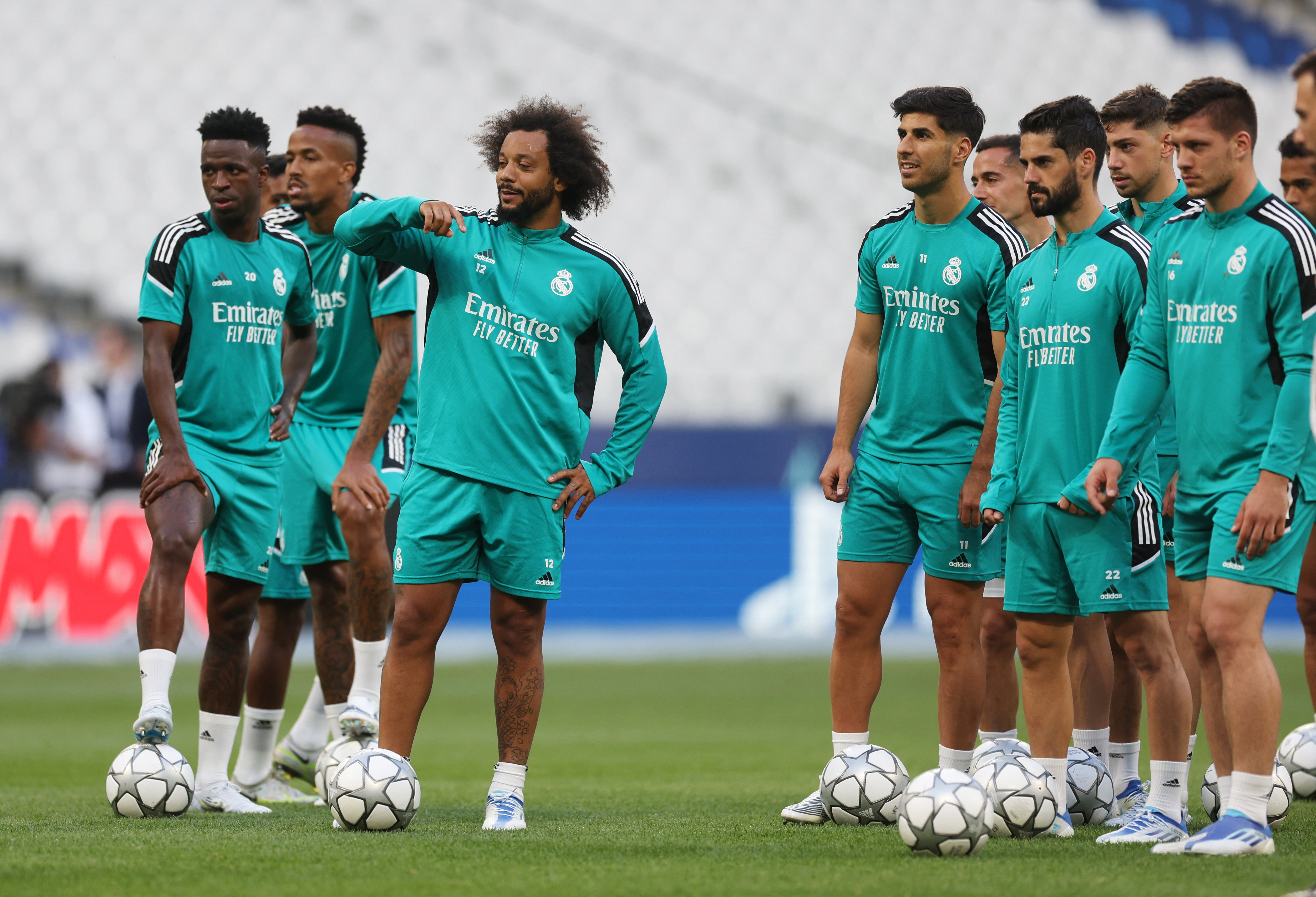 Soccer Football - Champions League - Champions League Final - Real Madrid Training - Stade de France, Saint-Denis near Paris, France - May 27, 2022 Real Madrid's Marcelo and teammates during training REUTERS/Lee Smith
