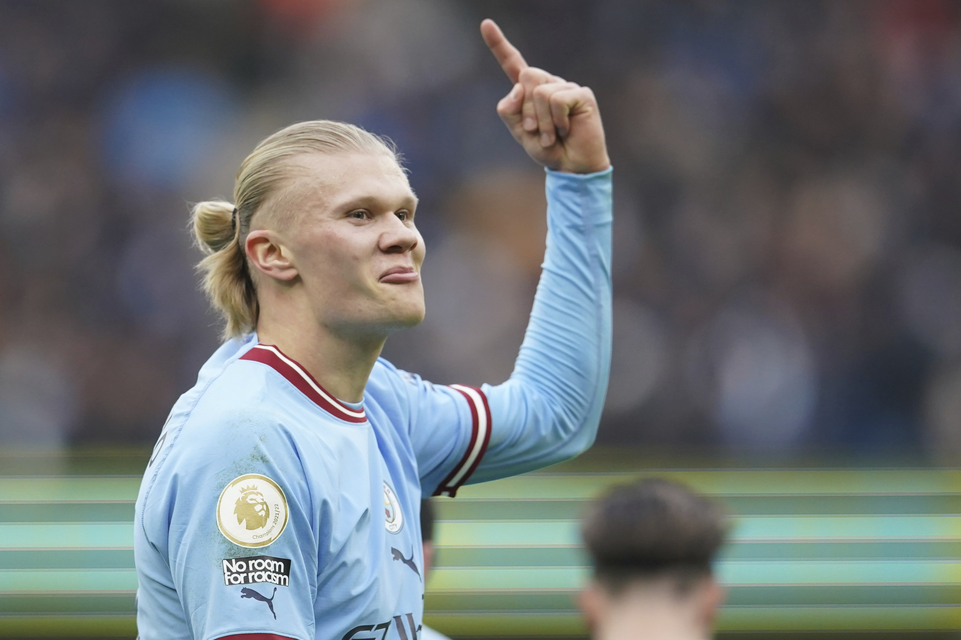 Erling Haaland scores Manchester City's opening goal in a 3-0 Premier League win over Wolverhampton, Sunday, Jan. 22, 2023. (AP Photo/Dave Thompson)