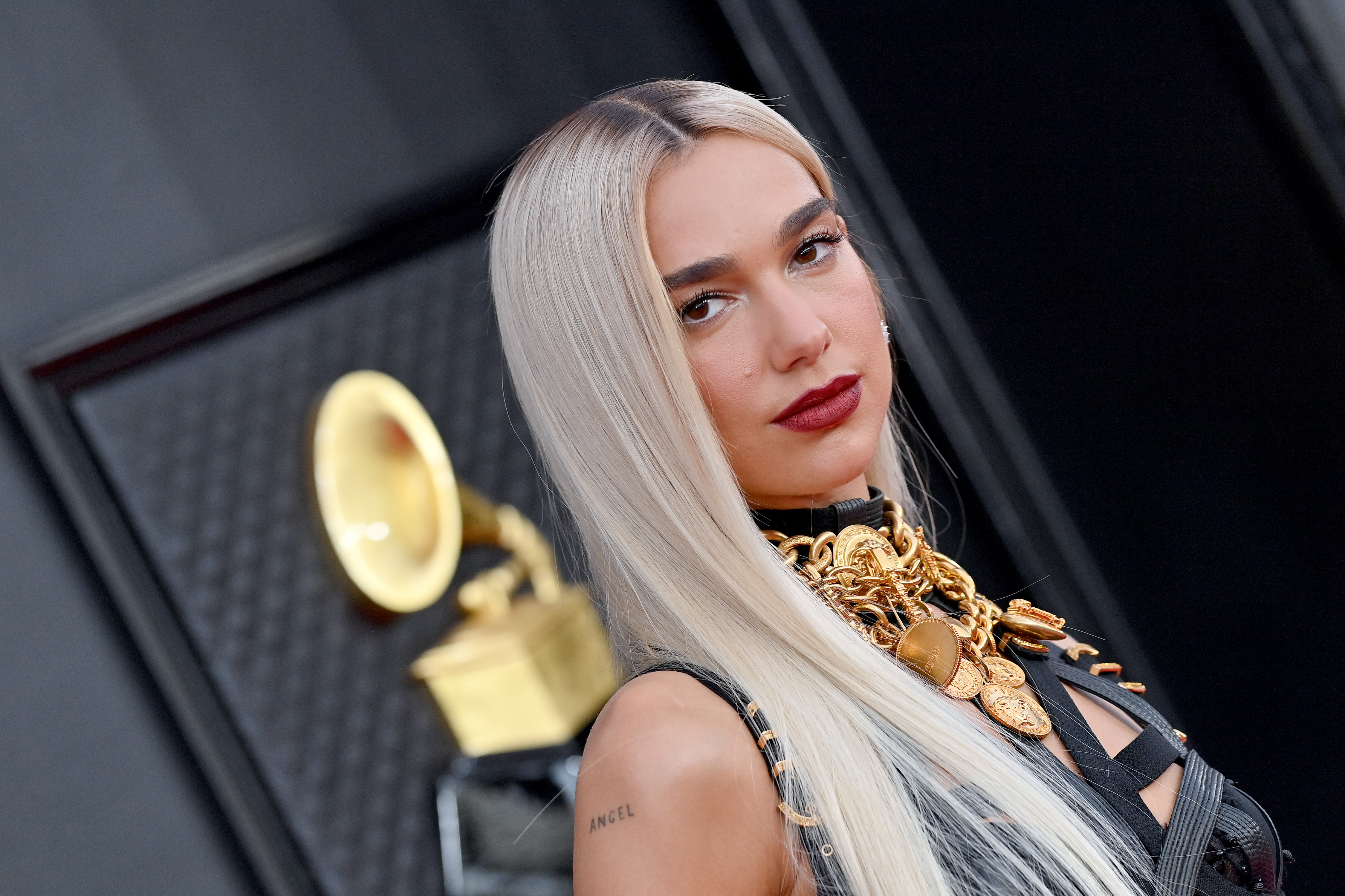 LAS VEGAS, NEVADA - APRIL 3: Dua Lipa attends the 64th Annual GRAMMY Awards at MGM Grand Garden Arena on April 3, 2022 in Las Vegas, Nevada.  She wears the same look as Madonna (Photo by Axelle/Bauer-Griffin/FilmMagic)
