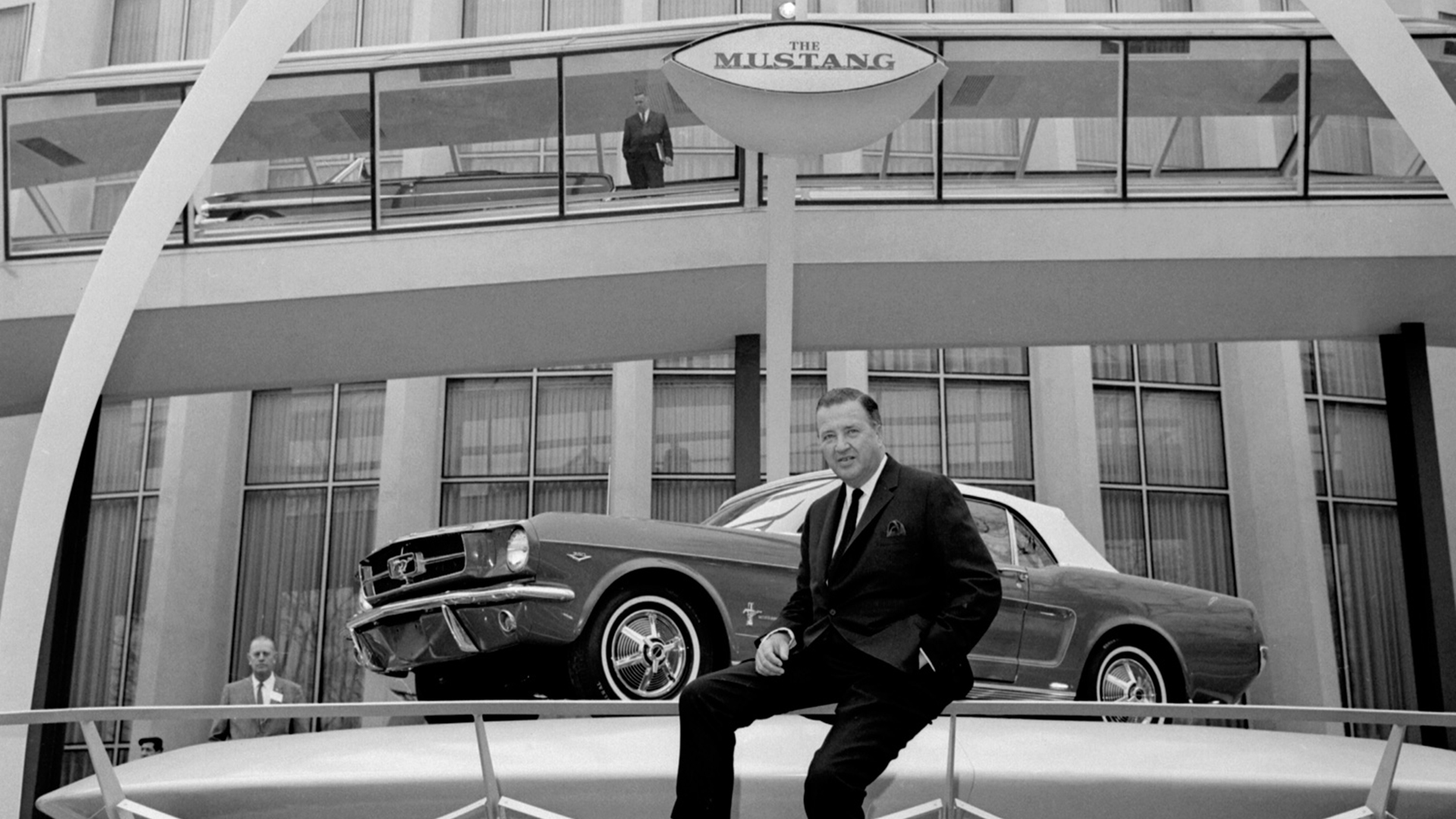 Henry Ford II el día de la presentación del Ford Mustang, en la Feria Mundial de New York de 1964. Ese día también se presentó el Big Red