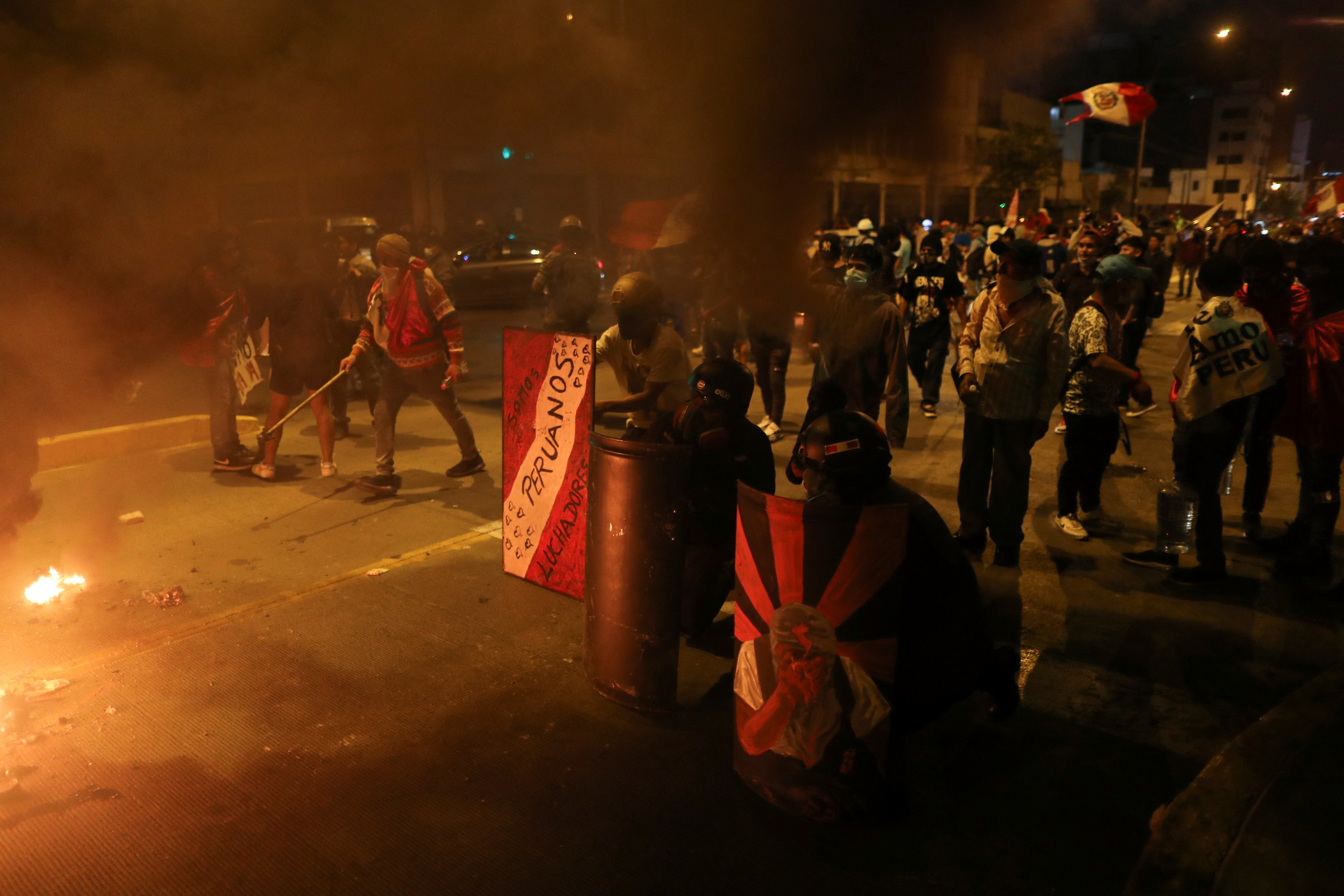 Demonstrators protest demanding the dissolution of Congress and to hold democratic elections rather than recognize Dina Boluarte as Peru's President, after the ousting of Peruvian President Pedro Castillo, in Lima, Peru December 12, 2022. REUTERS/Sebastian Castaneda