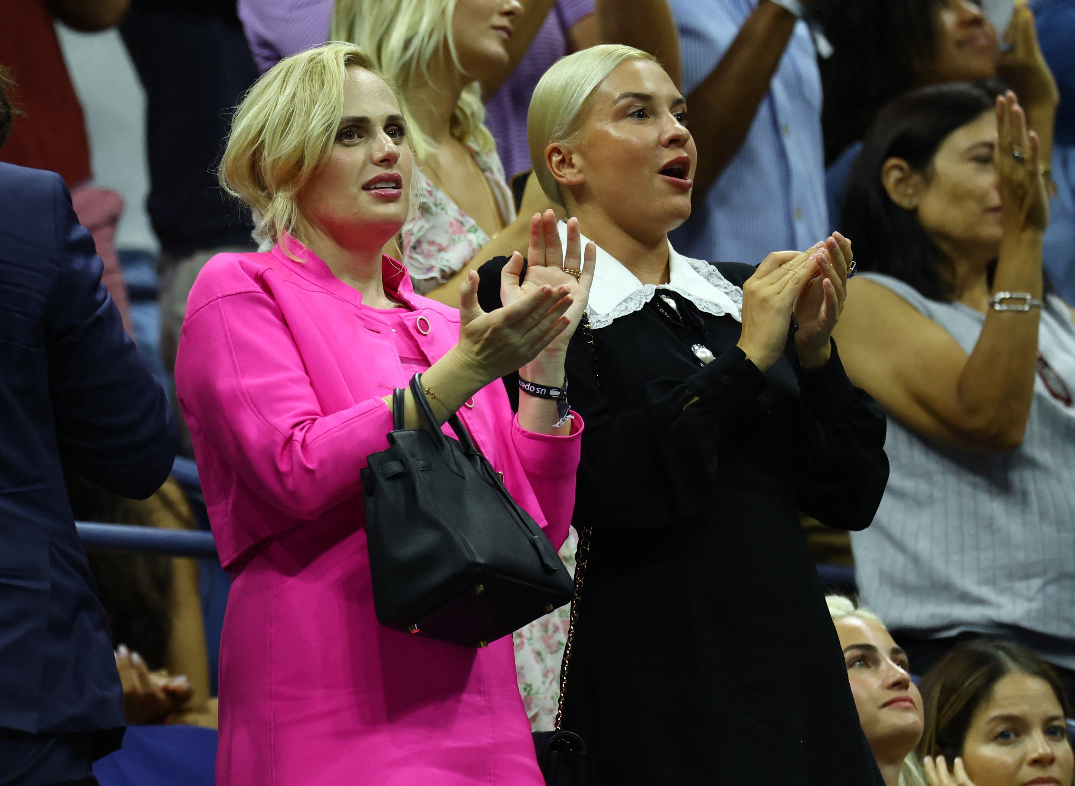   Actress Rebel Wilson and Ramona Agruma are seen during the first round match between Serena Williams of the USA and Danka Kovinic (Photo: REUTERS/Mike Segar of Montenegro)