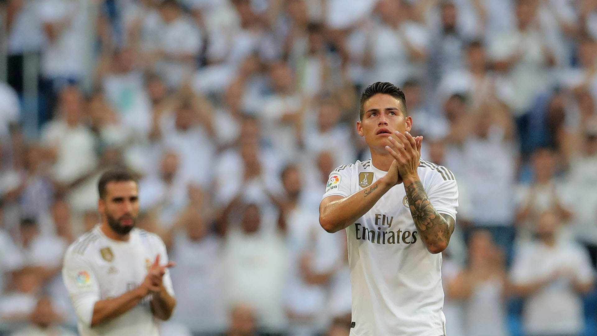 Soccer Football - La Liga Santander - Real Madrid v Real Valladolid - Santiago Bernabeu, Madrid, Spain - August 24, 2019 Real Madrid's James Rodriguez applauds the fans before being substituted REUTERS/Juan Medina