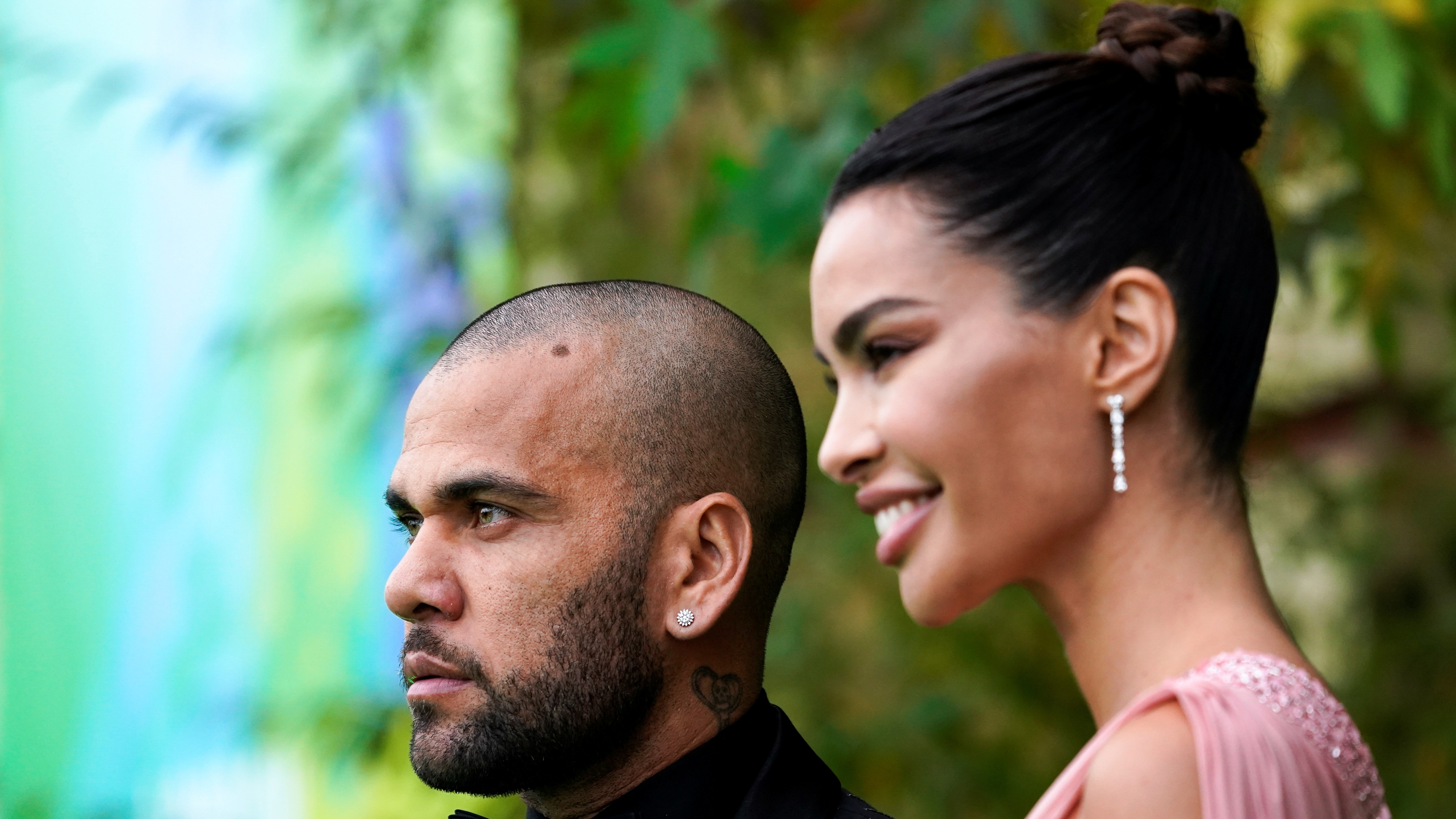 Football player Dani Alves with his wife Joana Sanz attend the first Earthshot awards ceremony at Alexandra Palace in London, Britain October 17, 2021. Picture taken October 17, 2021. Alberto Pezzali/Pool via REUTERS