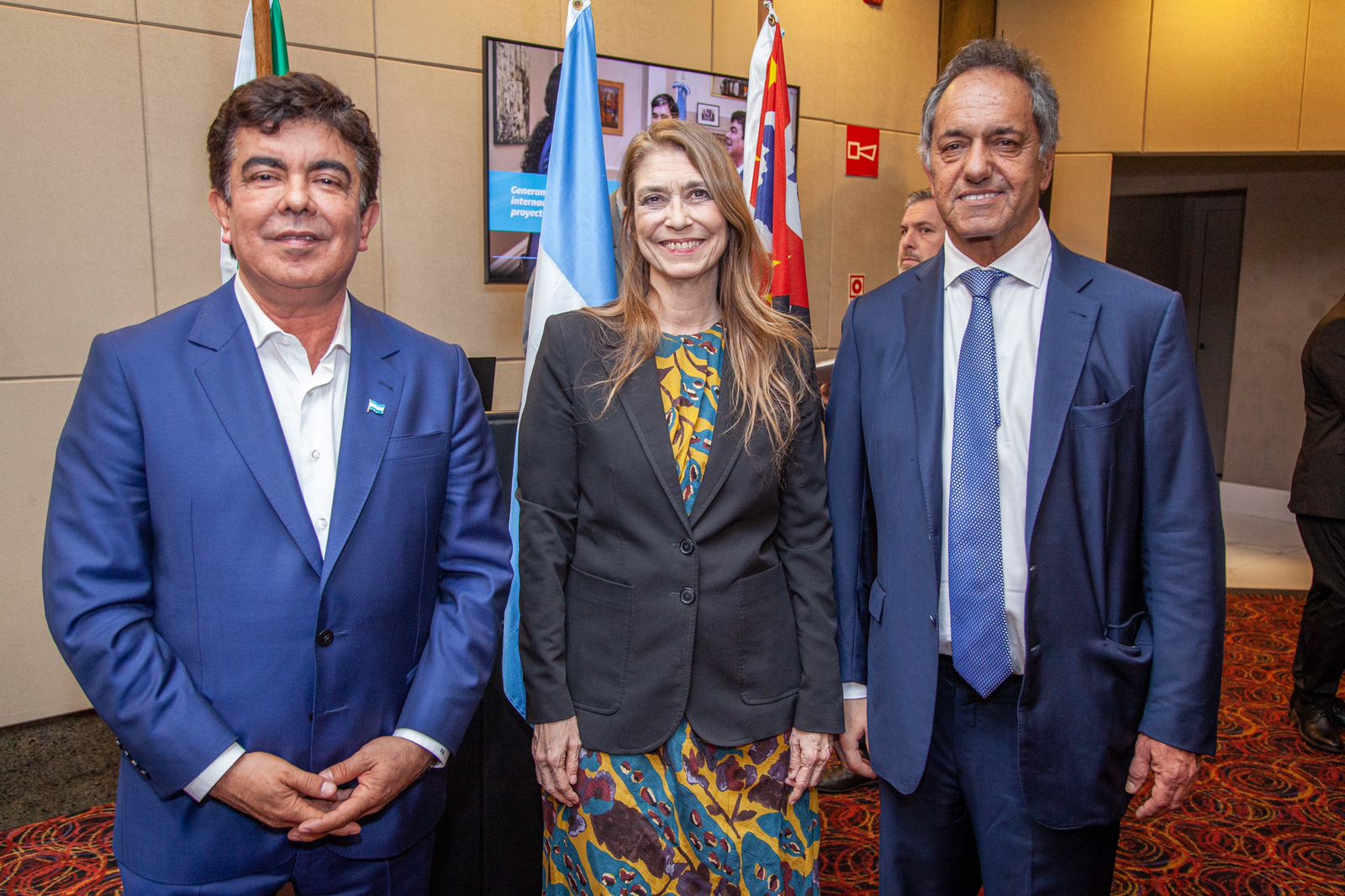 Fernando Espinoza, Debora Giorgi y Daniel Scioli 