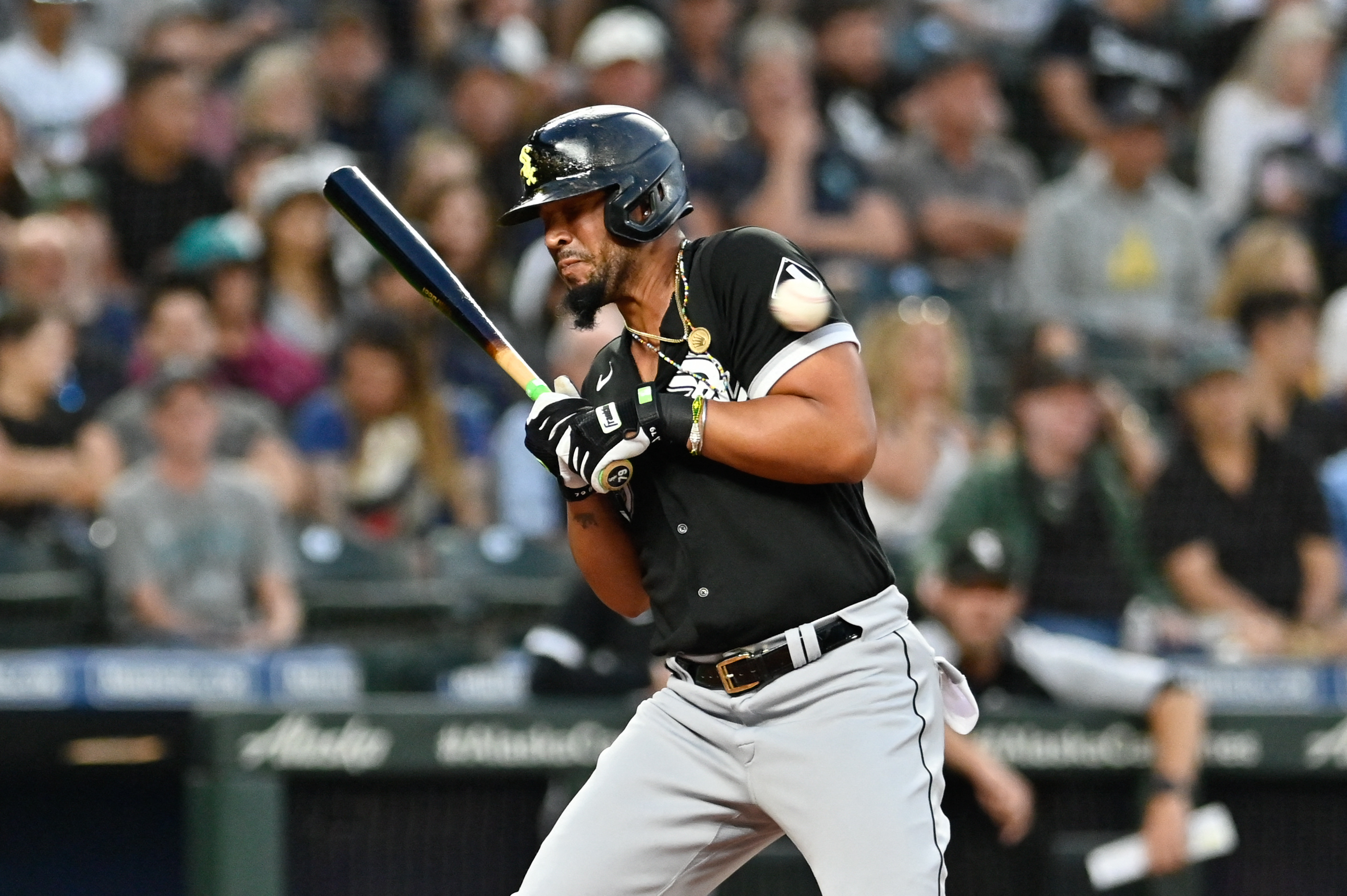 Sep 6, 2022; Seattle, Washington, USA; Chicago White Sox first baseman Jose Abreu (79) is hit by a pitch thrown by Seattle Mariners starting pitcher Logan Gilbert (not pictured) during the fourth inning at T-Mobile Park. Mandatory Credit: Steven Bisig-USA TODAY Sports